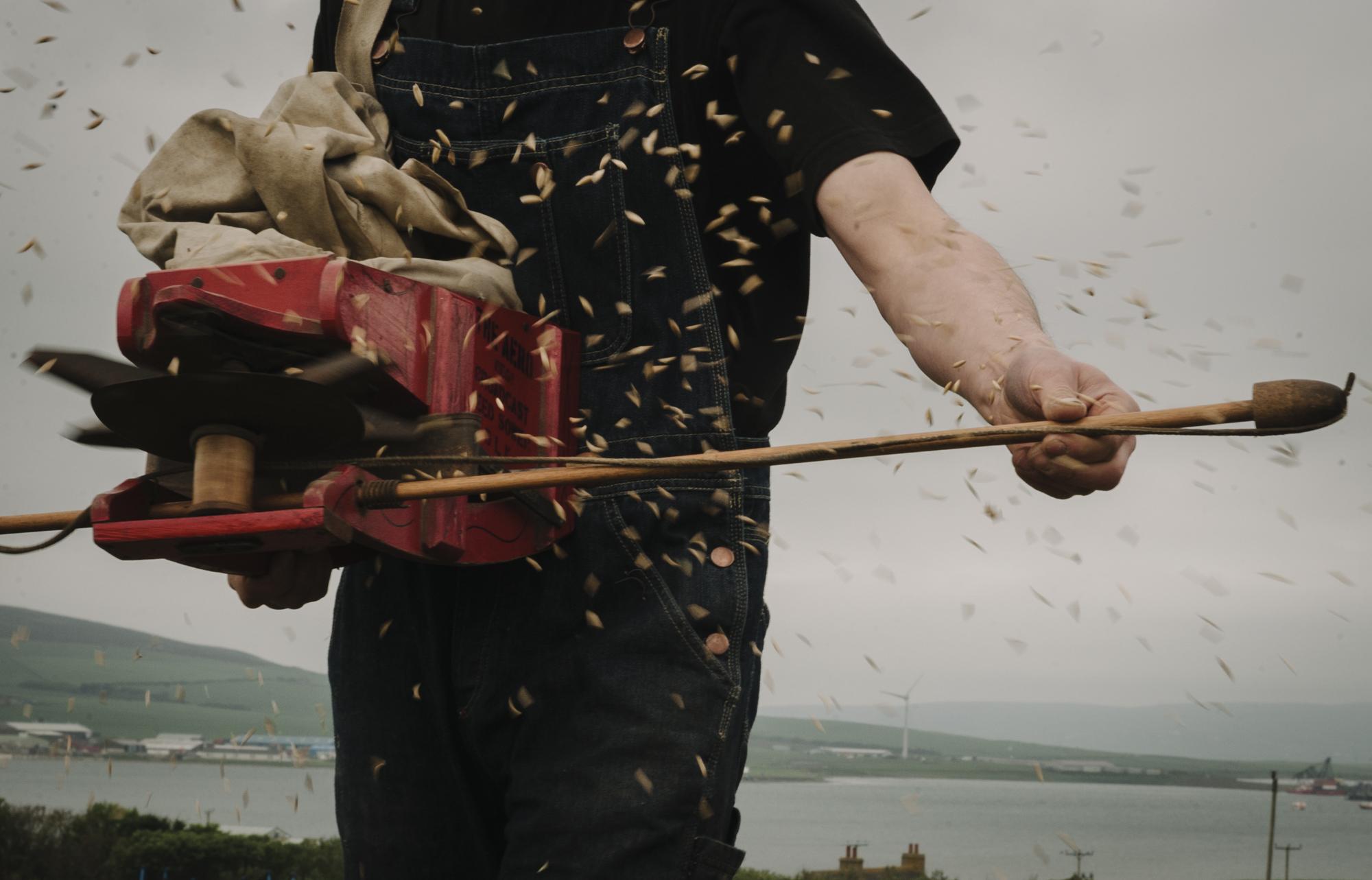 Linda laird first picture in series of a man stripping craft material