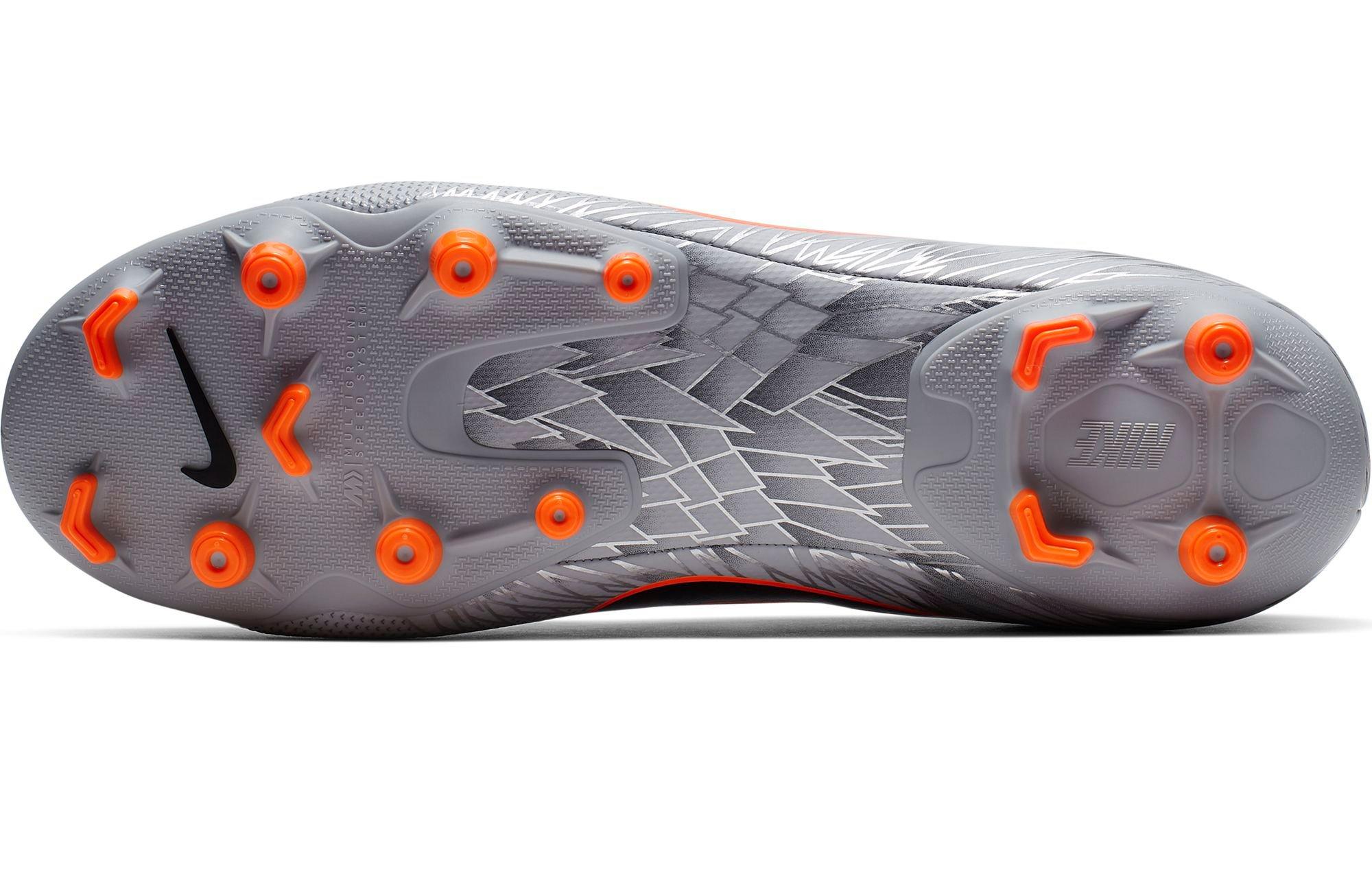 Grey and store orange soccer cleats