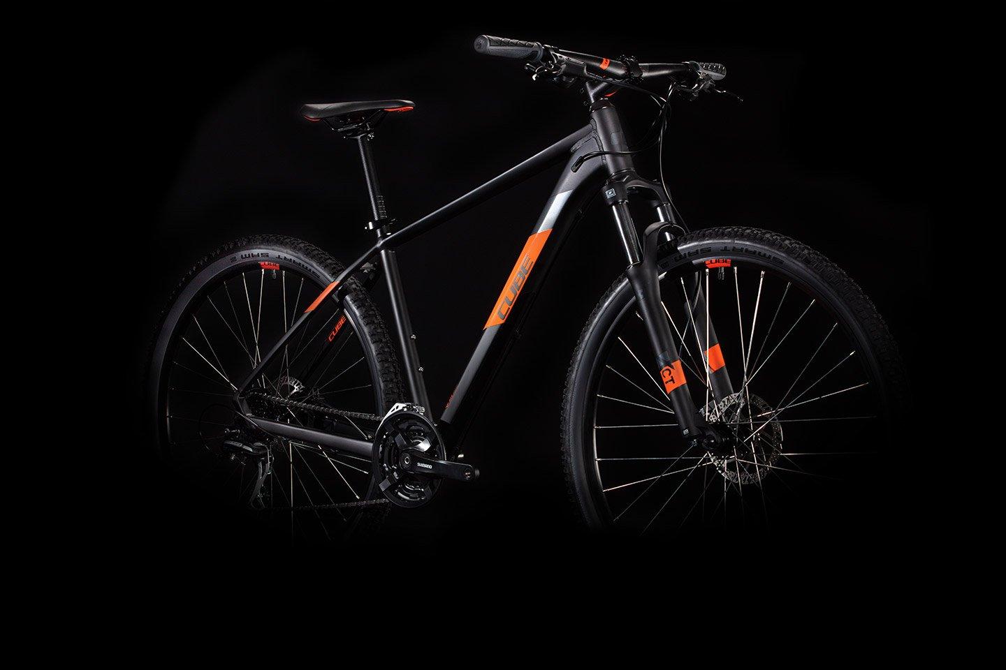 Black and orange store cube mountain bike