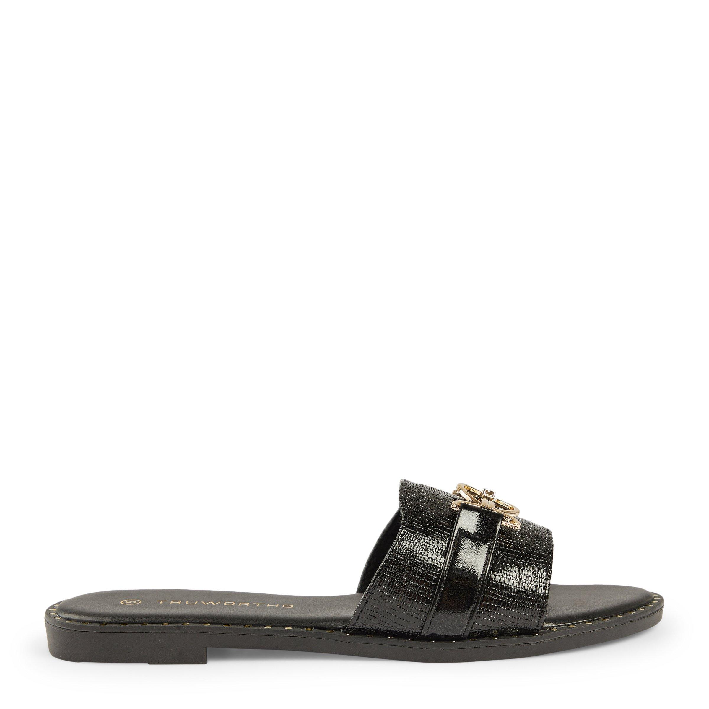 FLAT MULE IN BLACK CALFSKIN WITH GOLD HARDWARE main image 1