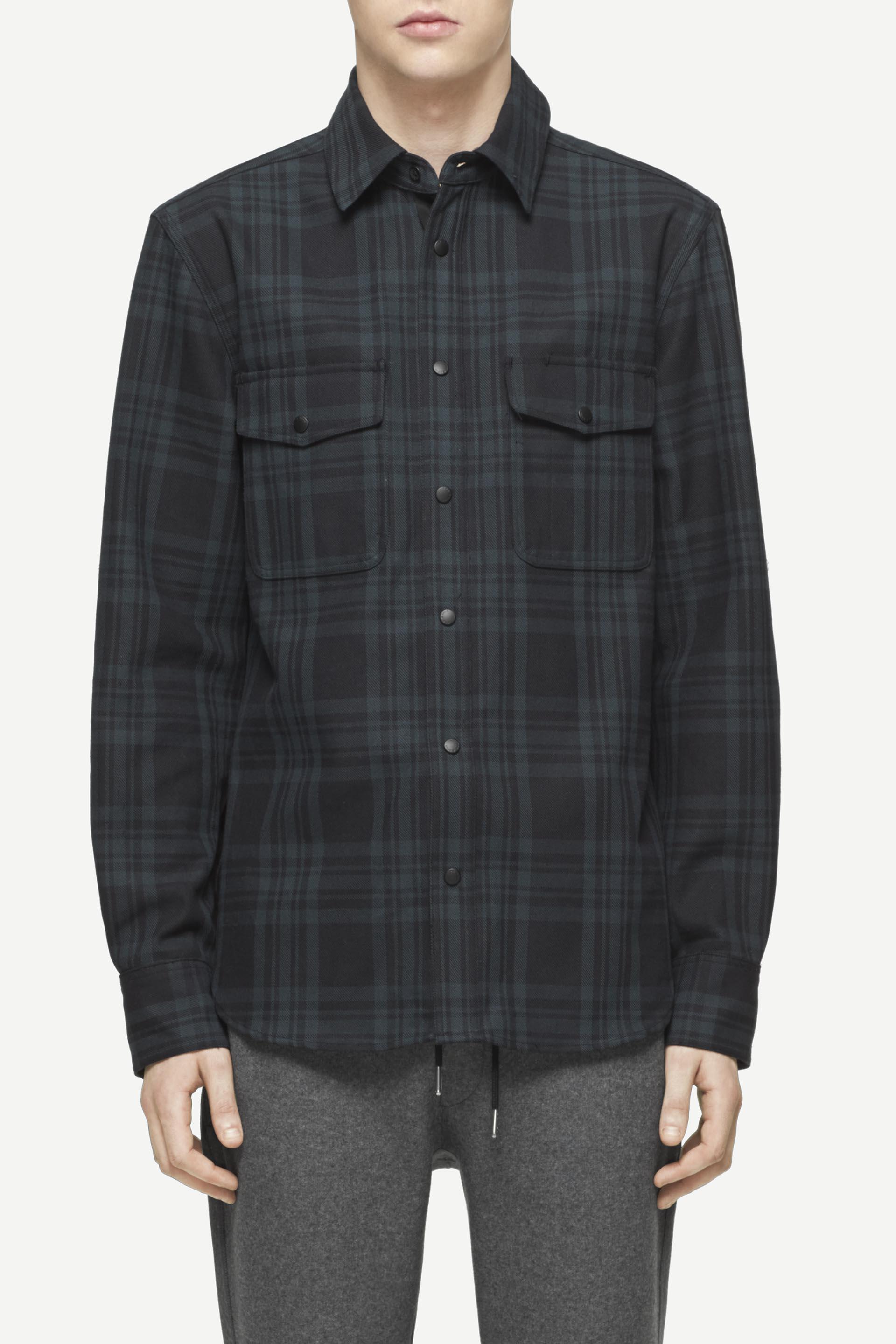 black shirt with elbow patch