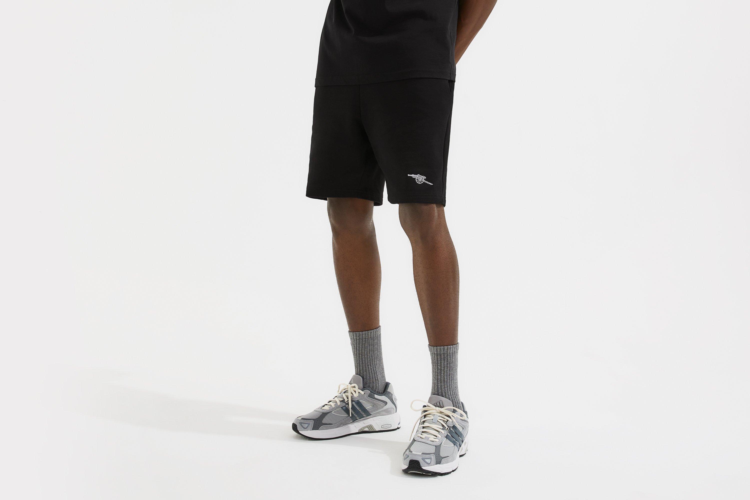 Arsenal Essentials Black Cannon Shorts | Official Online Store