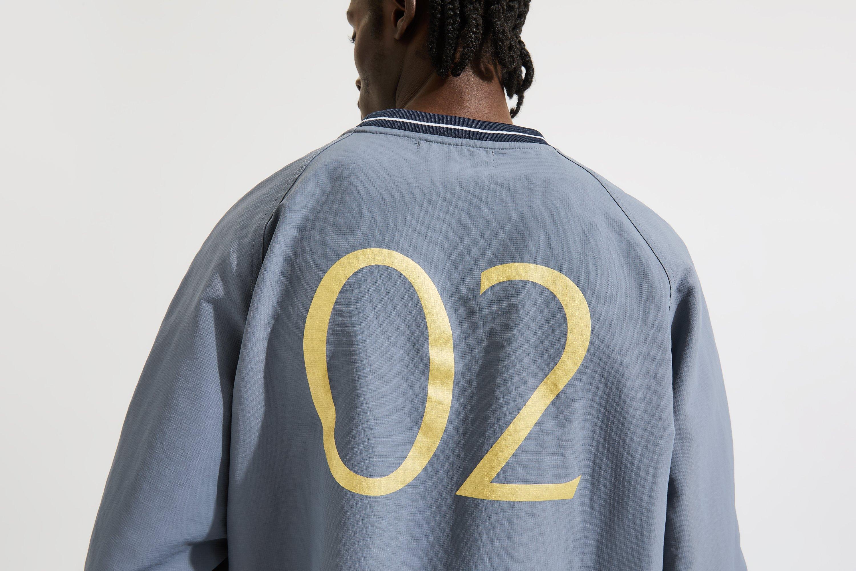 Arsenal Gunners Shell Top | Official Online Store