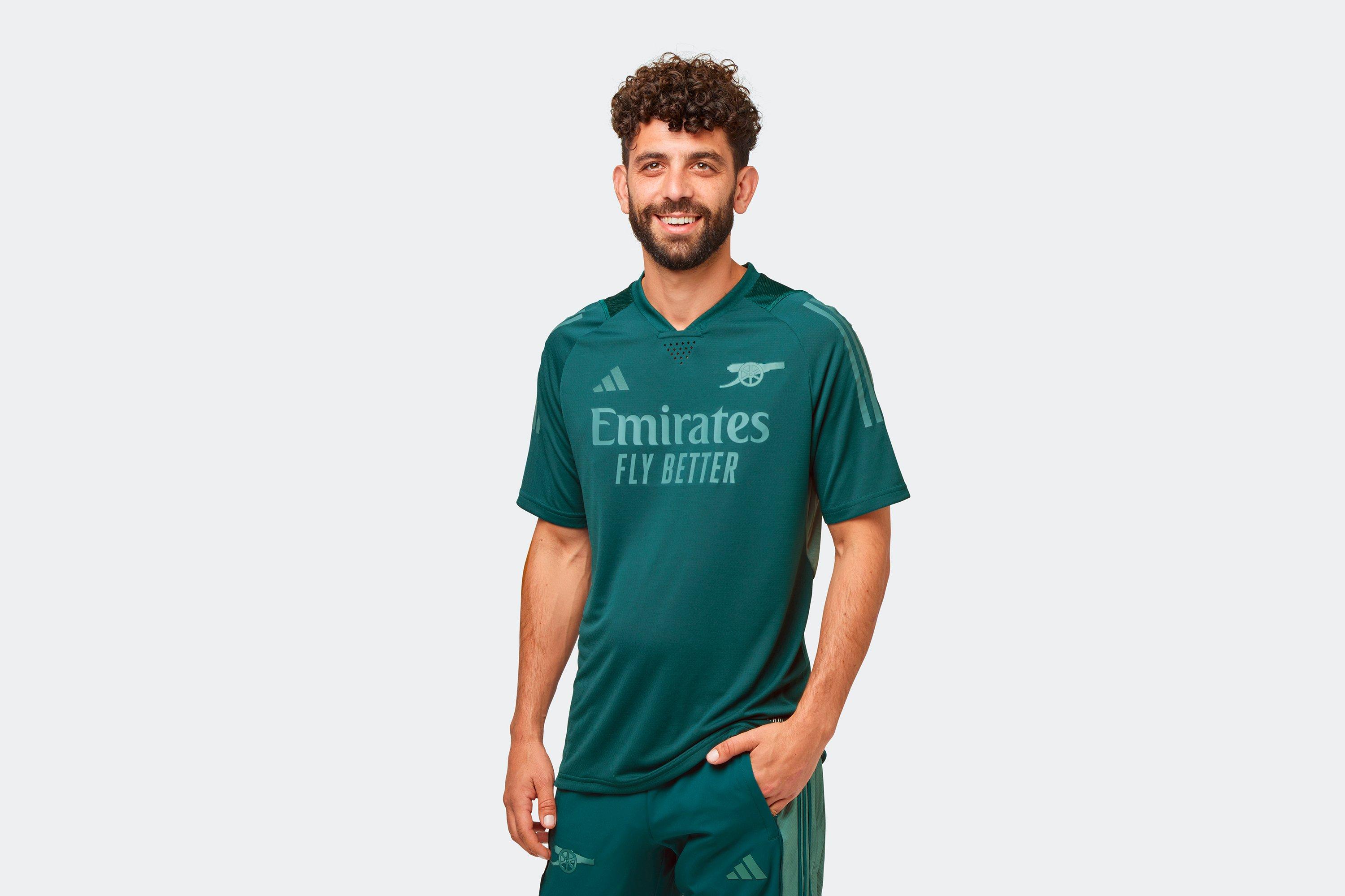 Arsenal green store training shirt