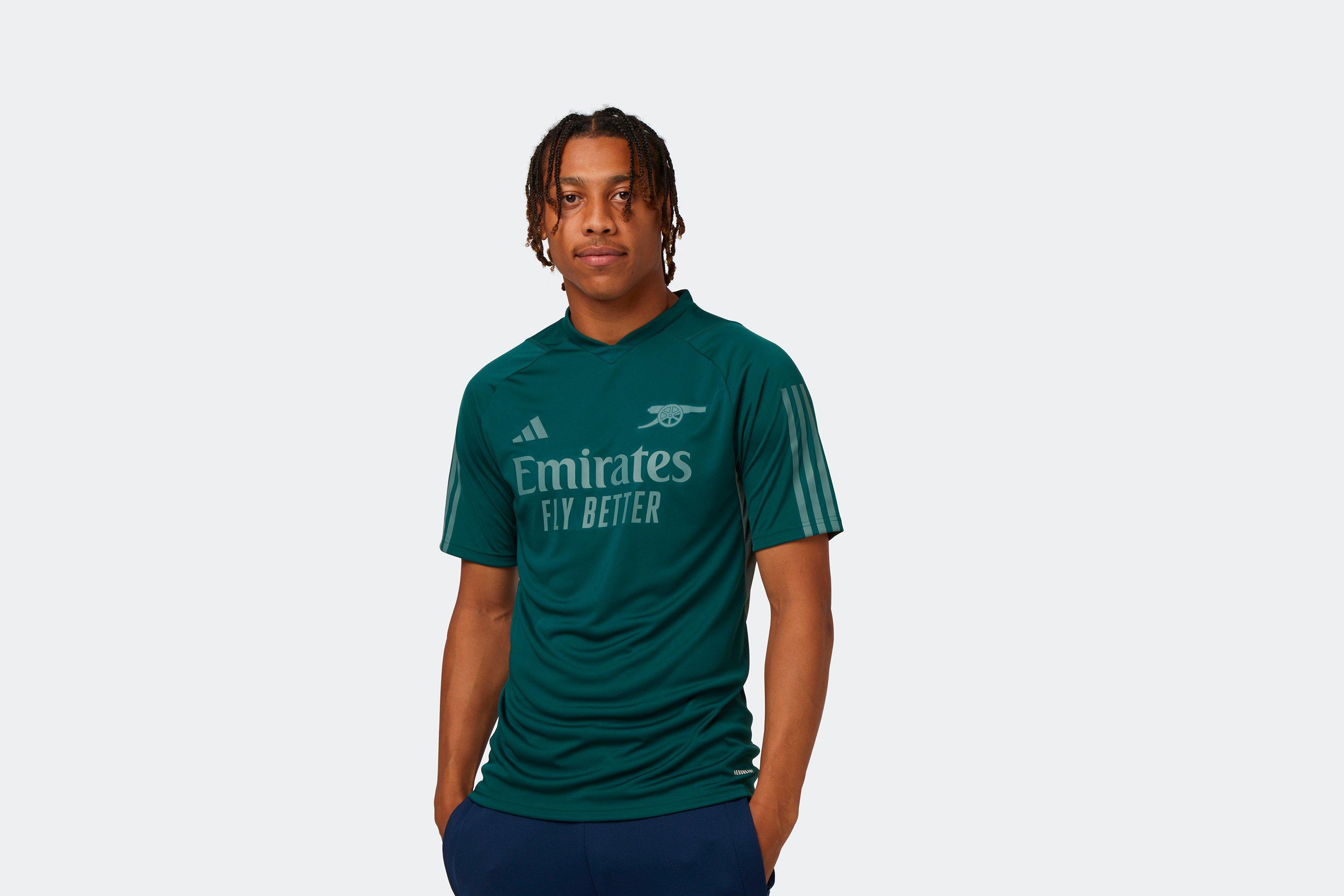 Arsenal green training store shirt