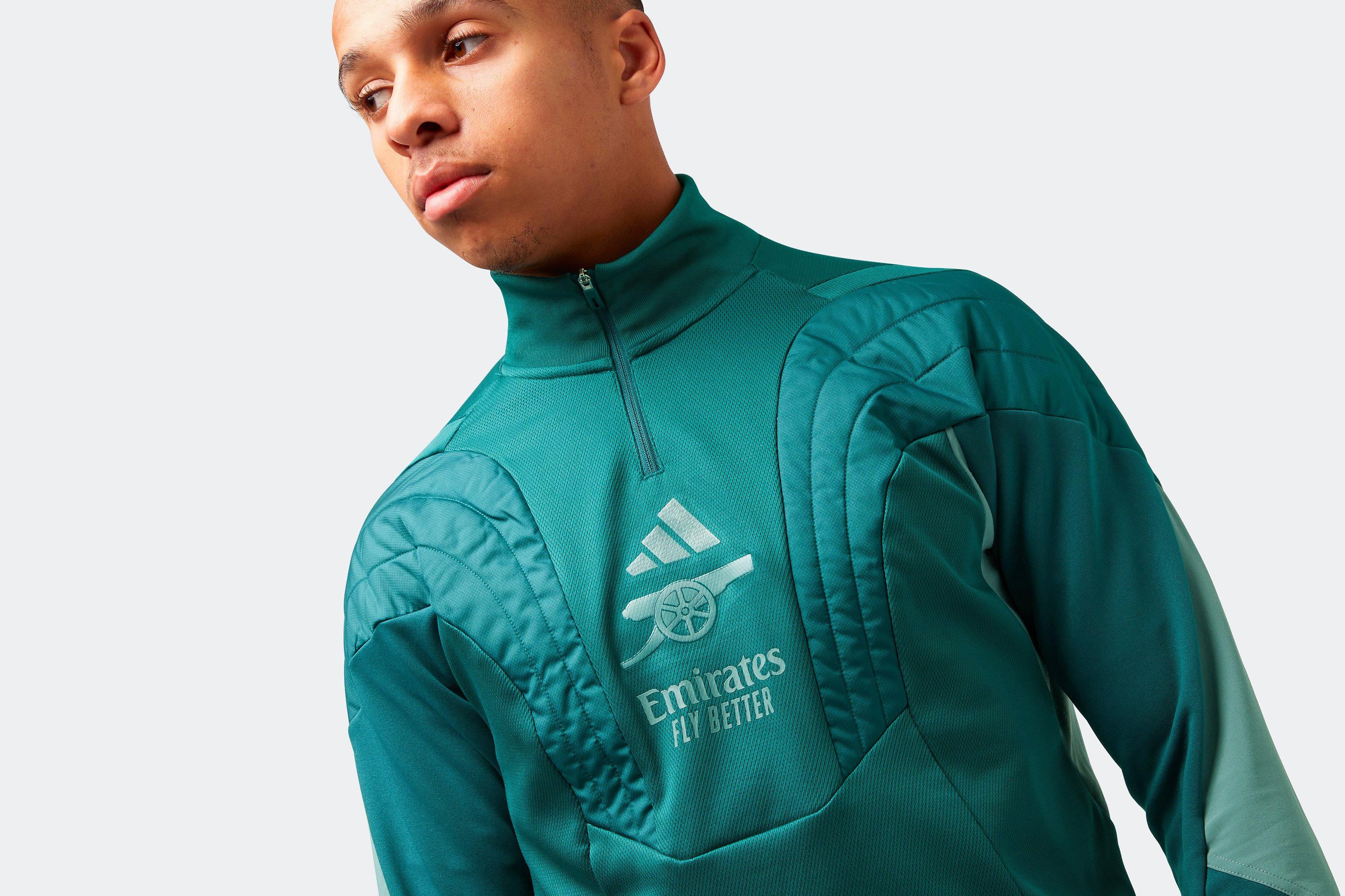 Arsenal green training store top