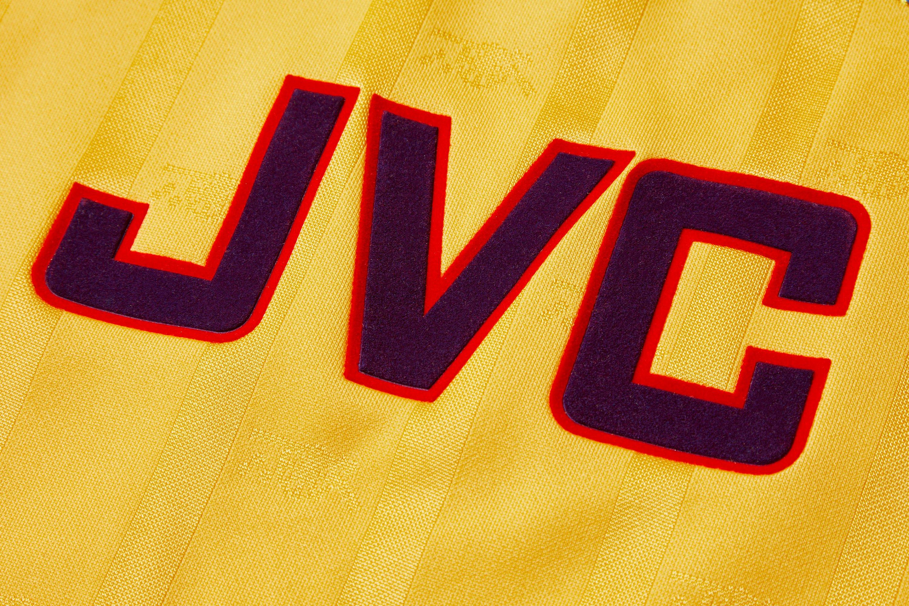 Yellow jvc 2024 arsenal shirt