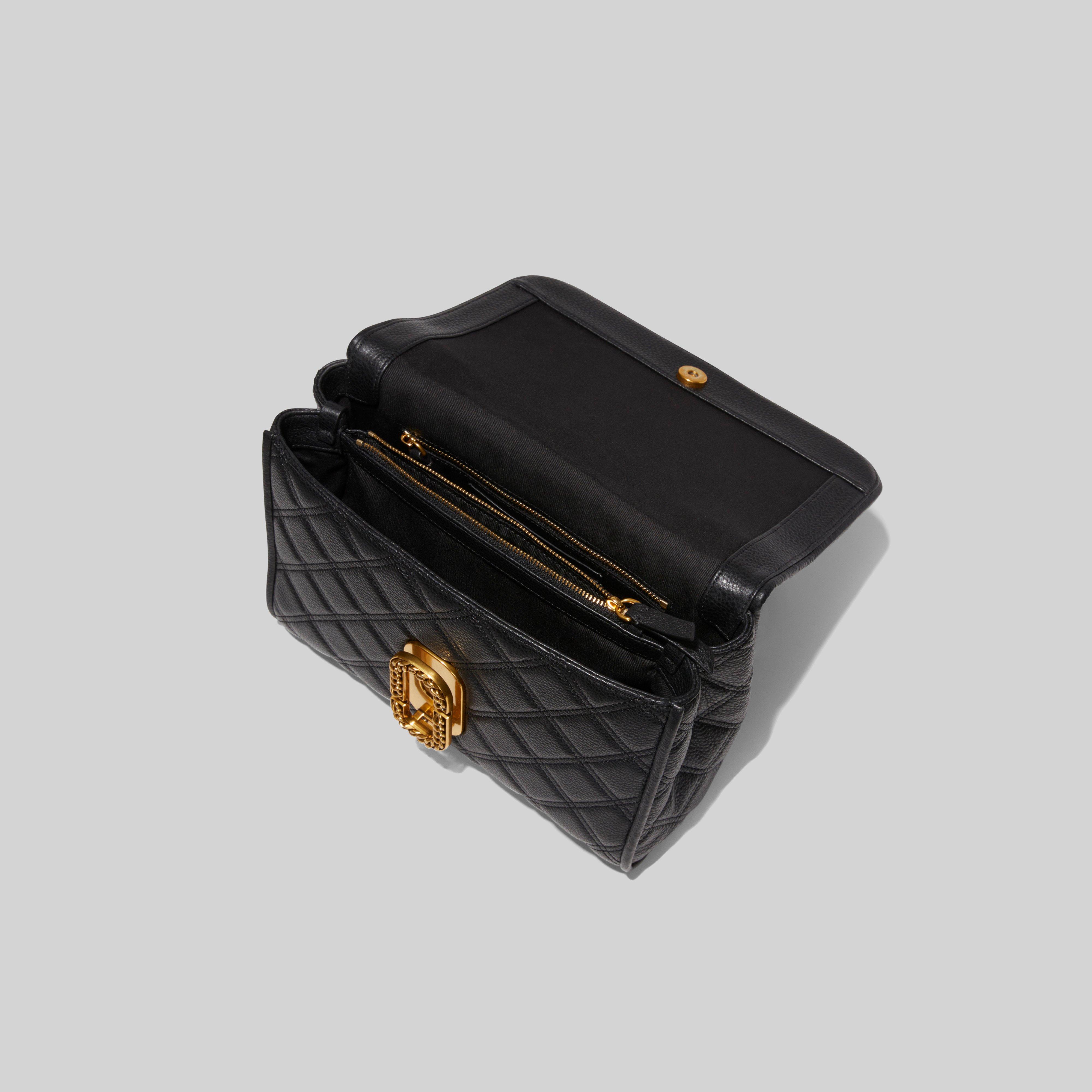 The Status Top Handle