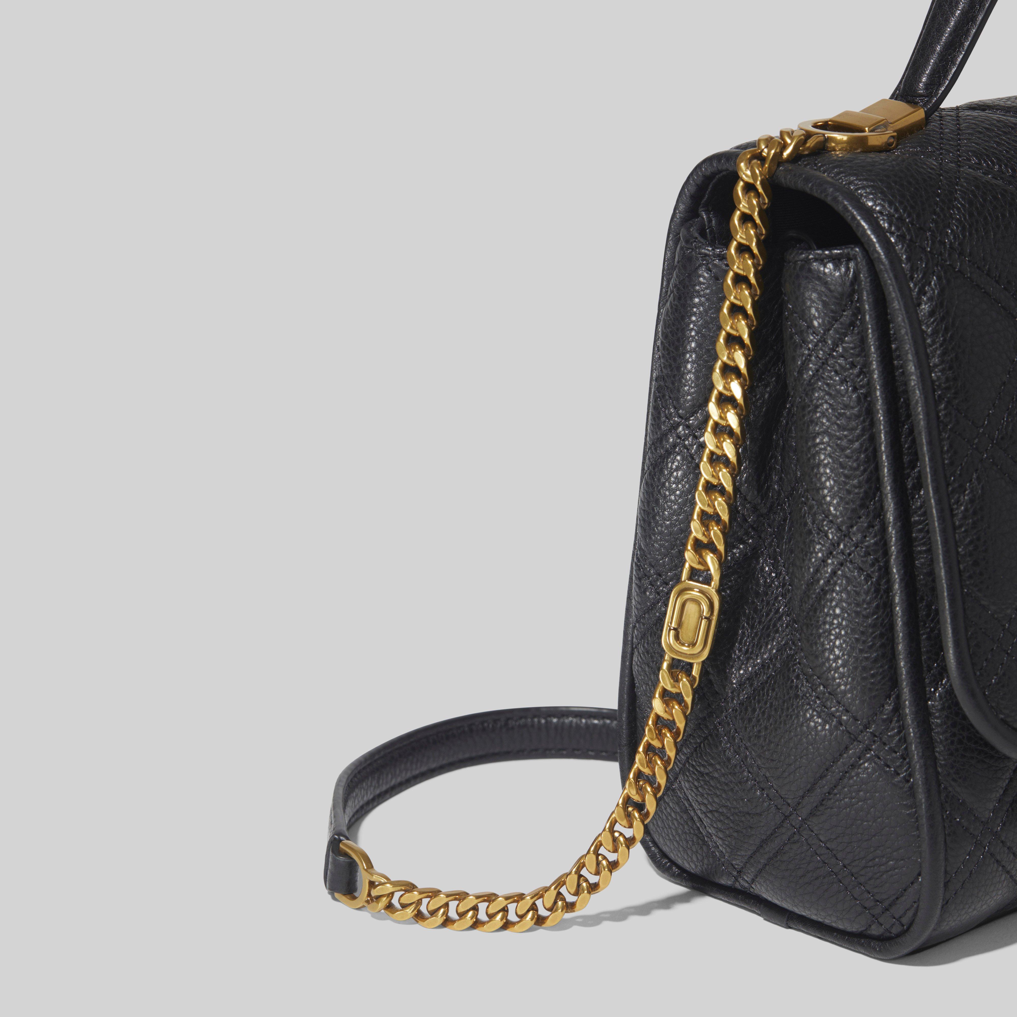 The Status Top Handle