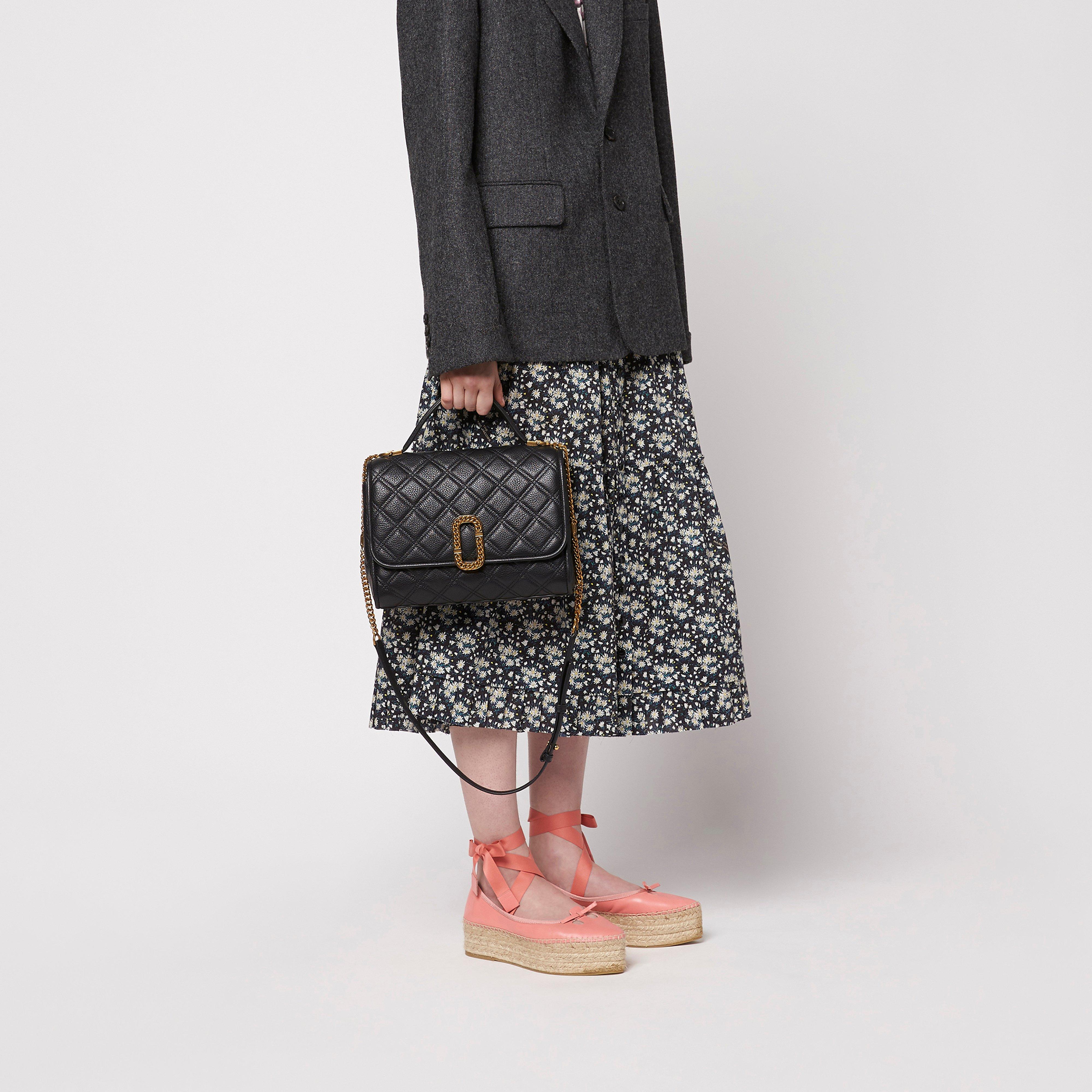 The Status Top Handle