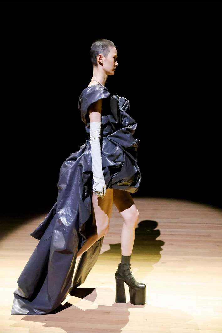 A model wears an outfit by US fashion designer Marc Jacobs for