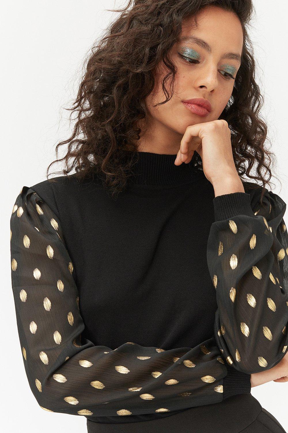 black jumper with see through sleeves