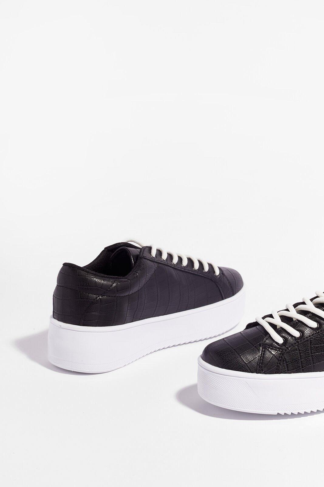 black leather platform trainers