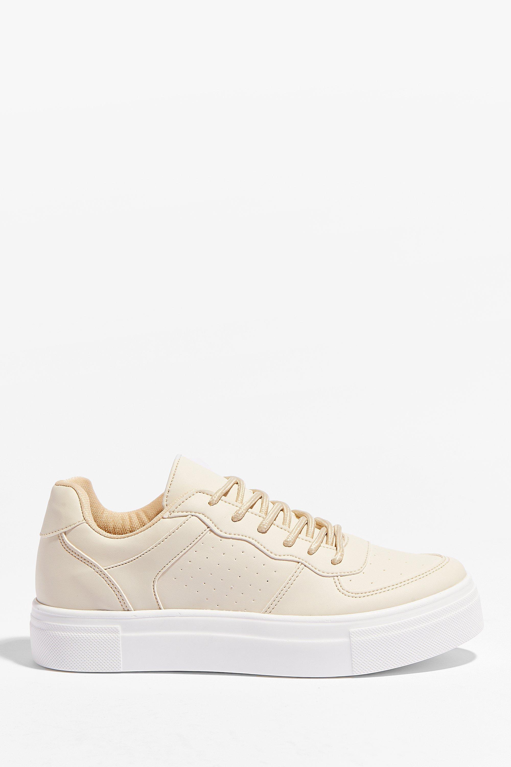 white faux leather flatform trainers