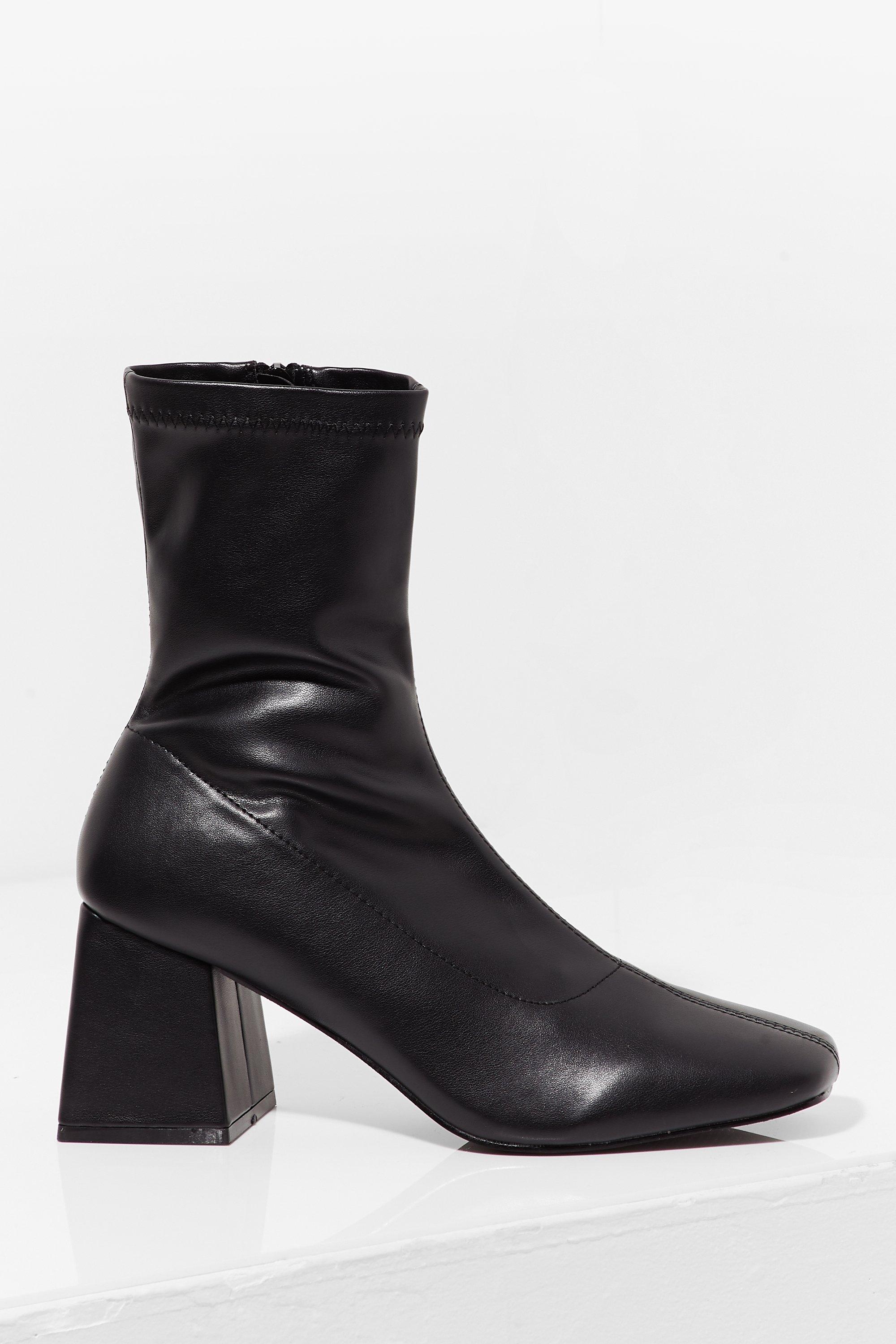 black faux leather heeled boots