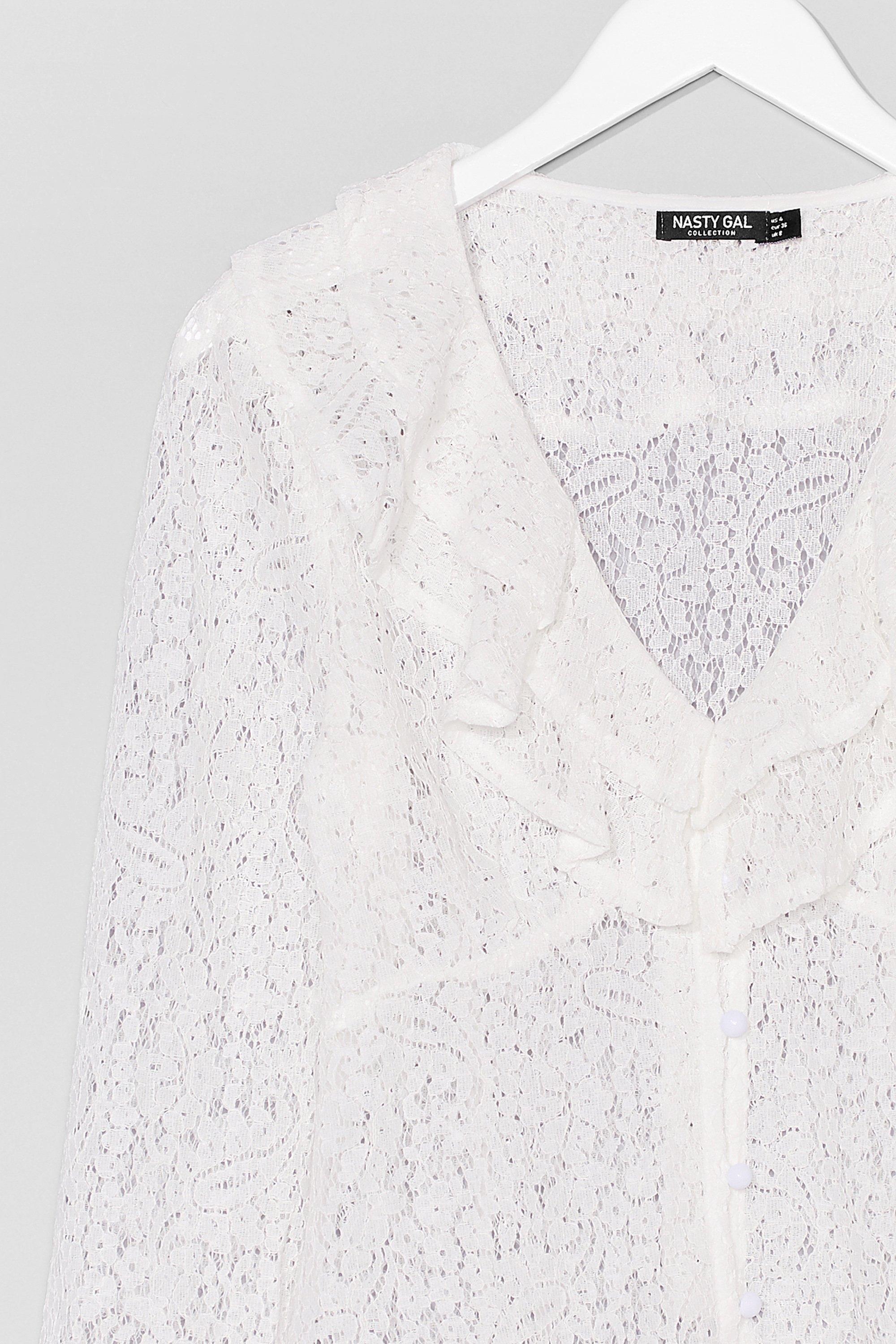 white v neck ruffle blouse