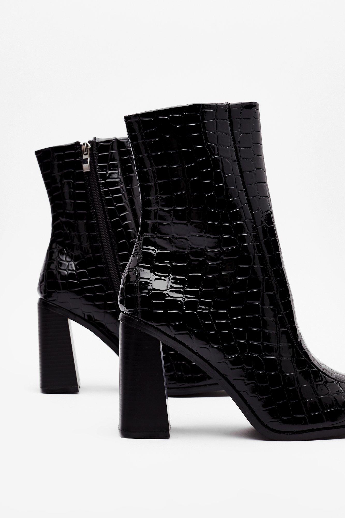 black heeled croc boots