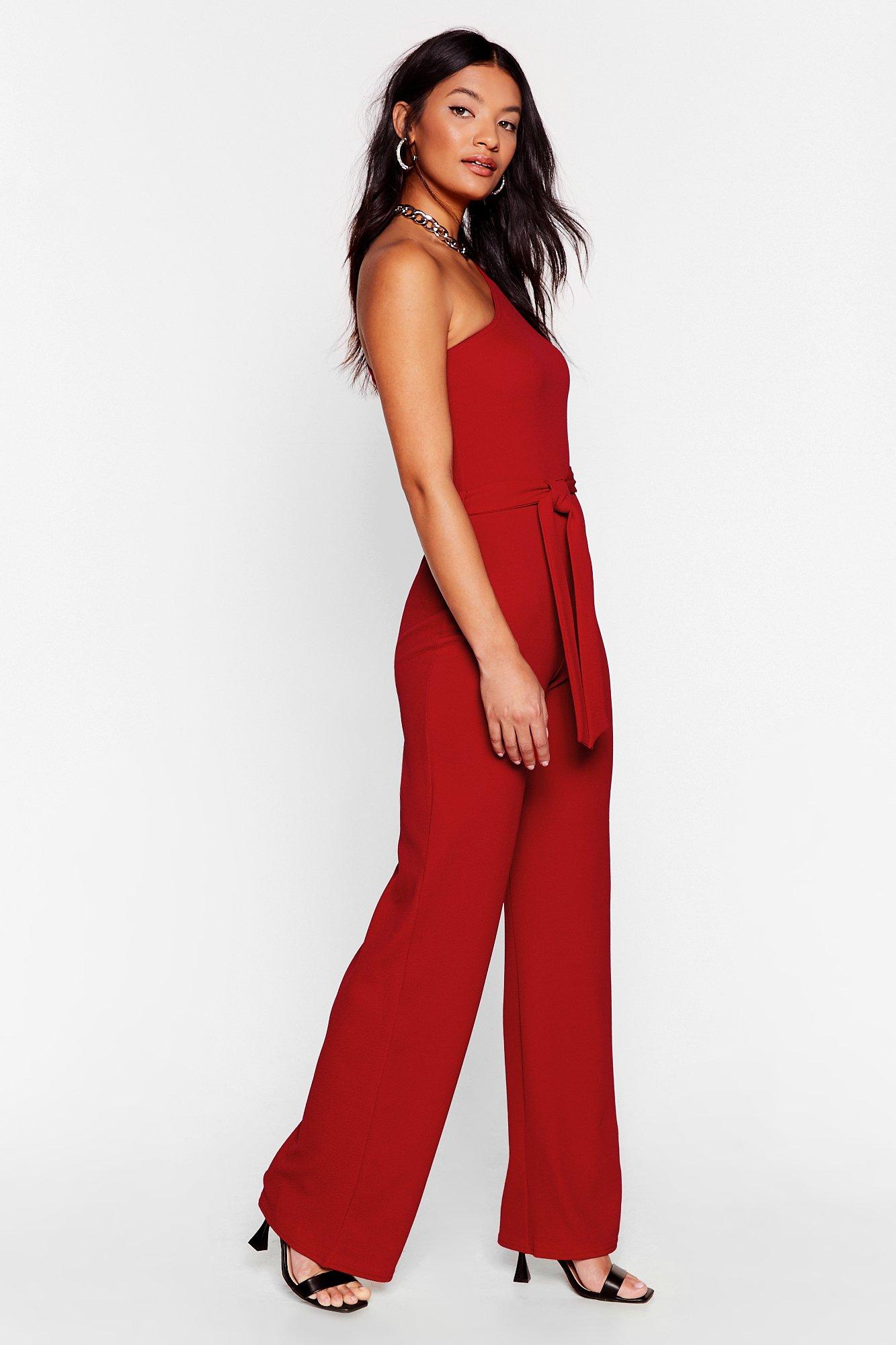 red belted one shoulder jumpsuit
