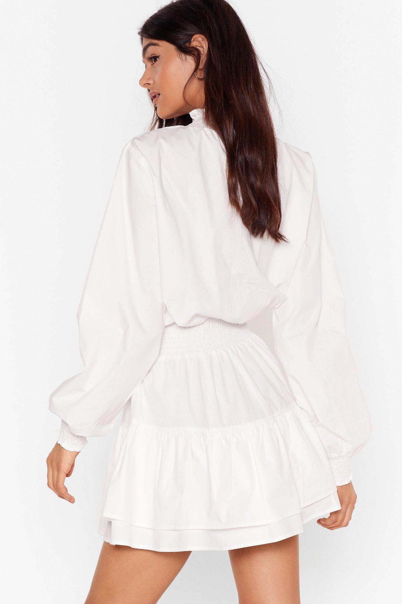 white ruffle neck dress