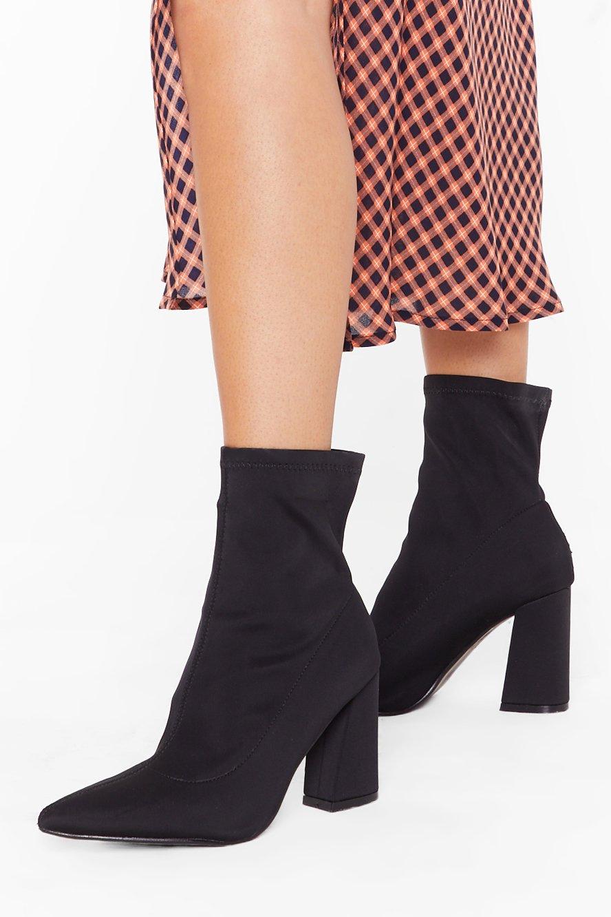 black pointed toe sock boots