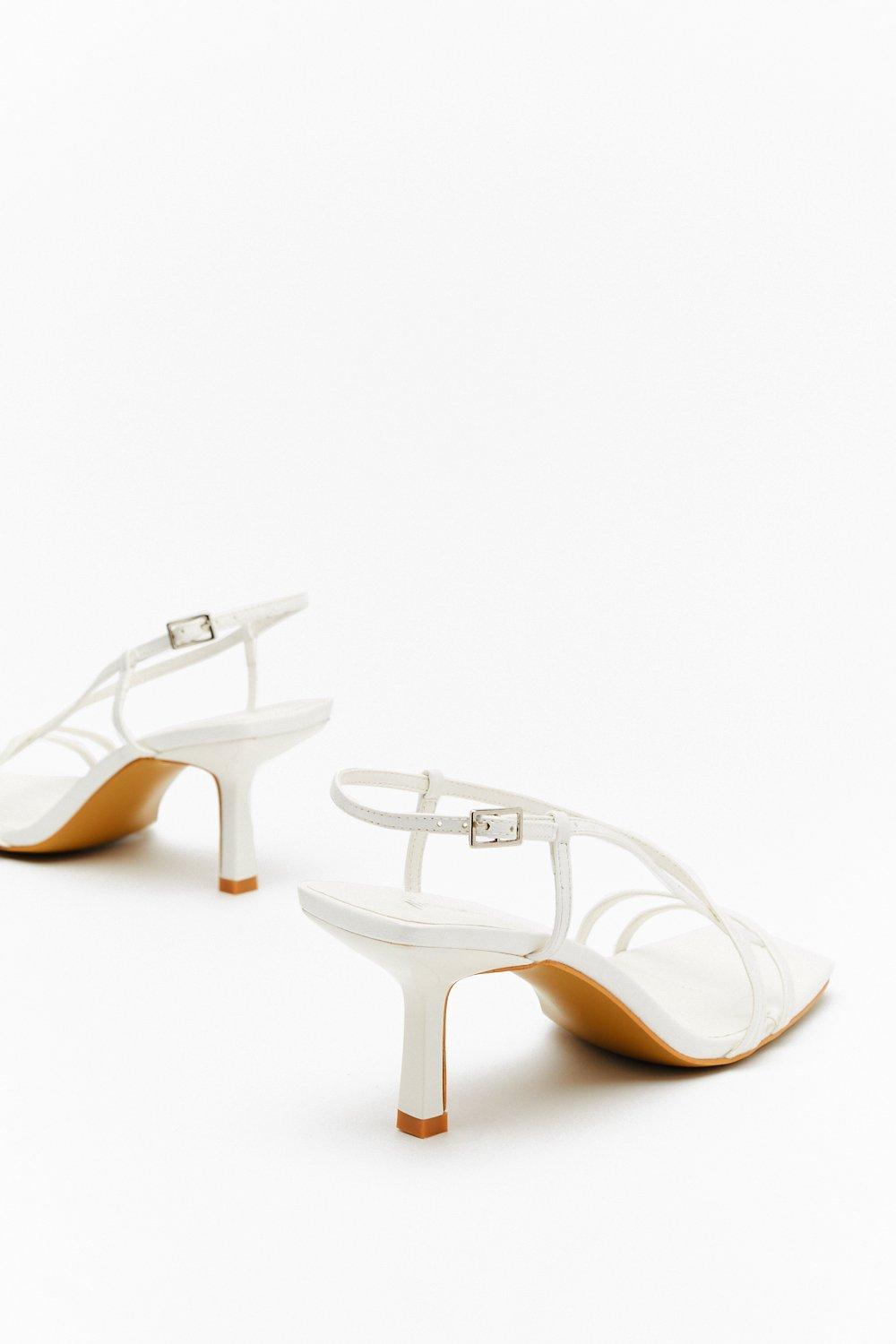strappy white kitten heels