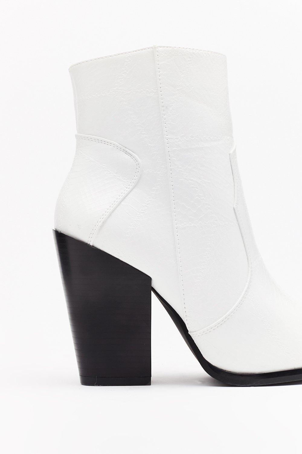 white boots with black heel