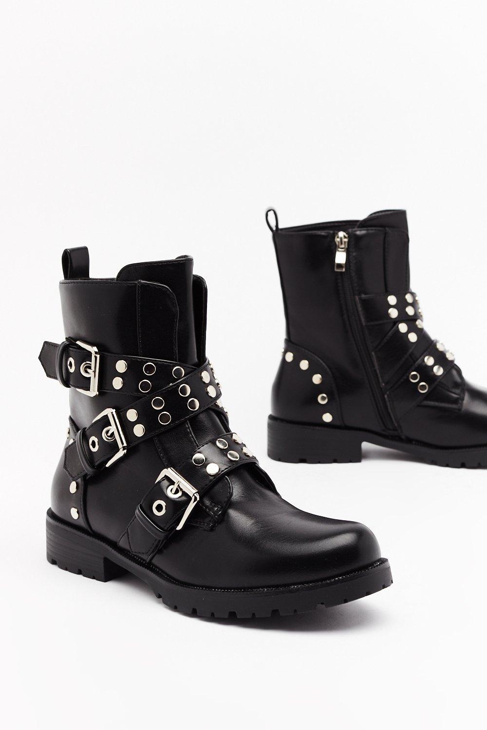 black flat buckle boots