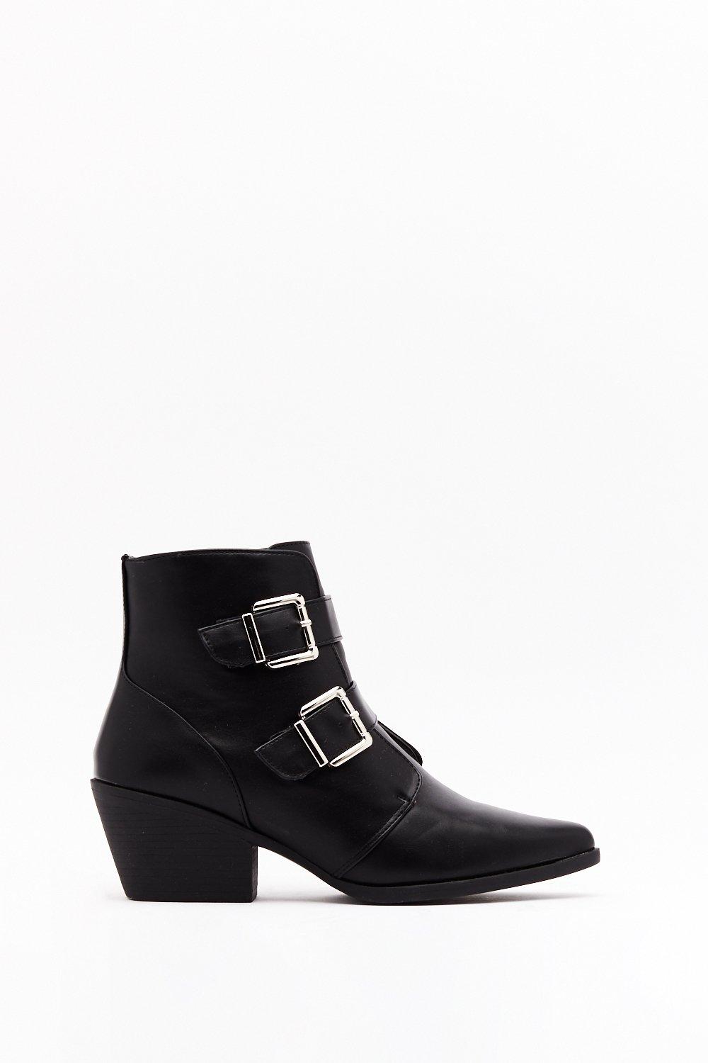 pointed toe buckle boots