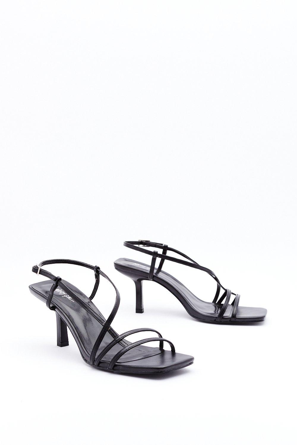 strappy white kitten heels