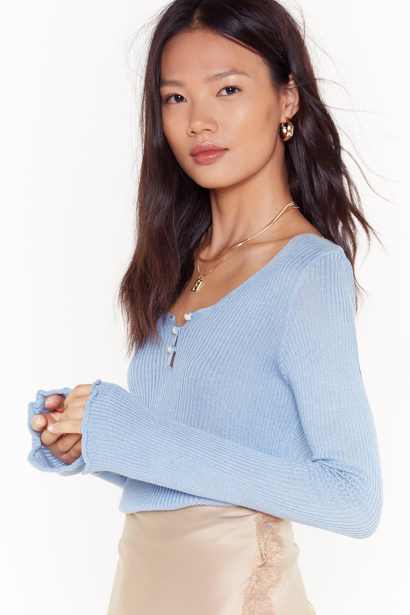 light blue ribbed sweater