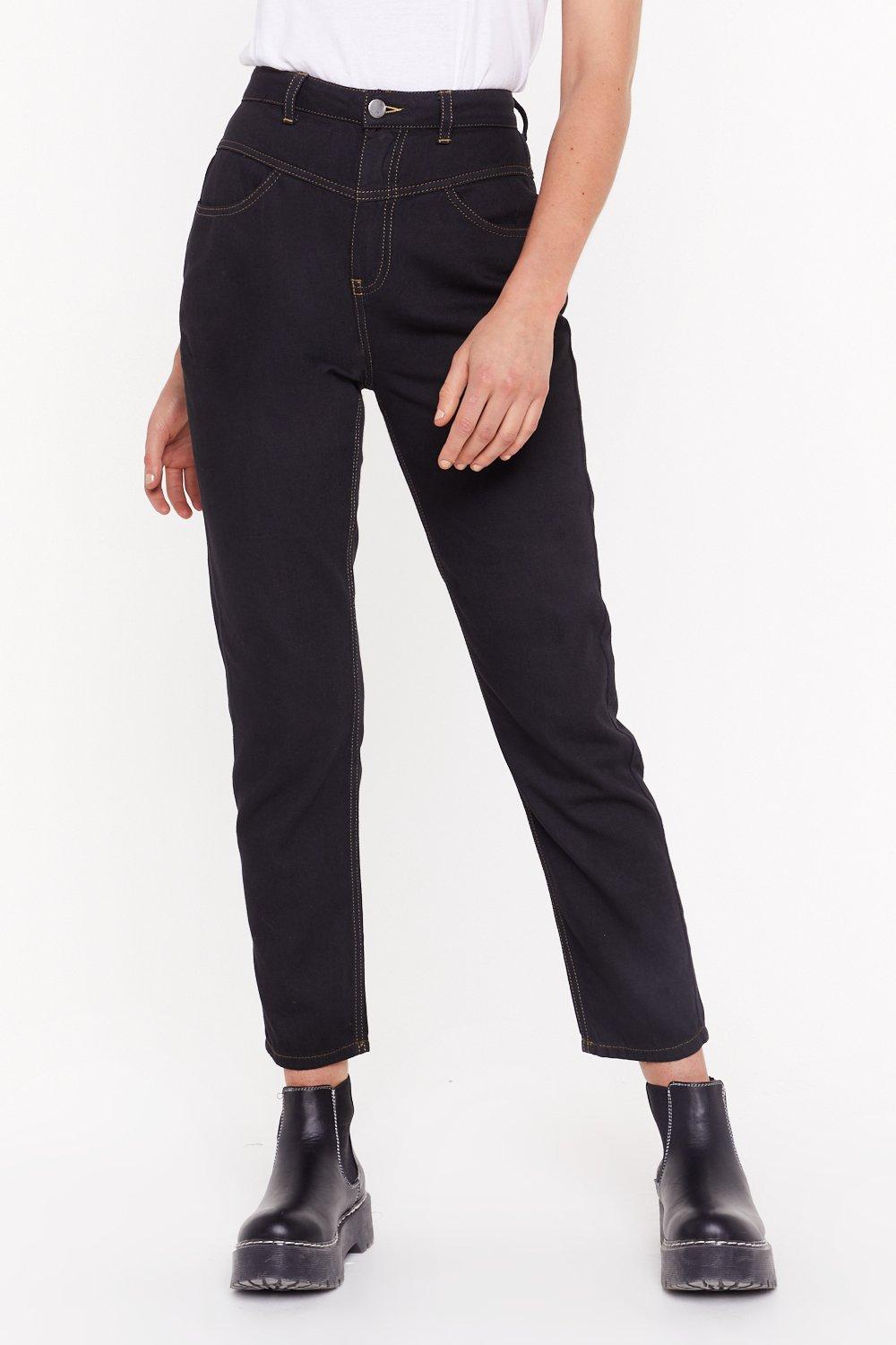 black mom jeans with white stitching