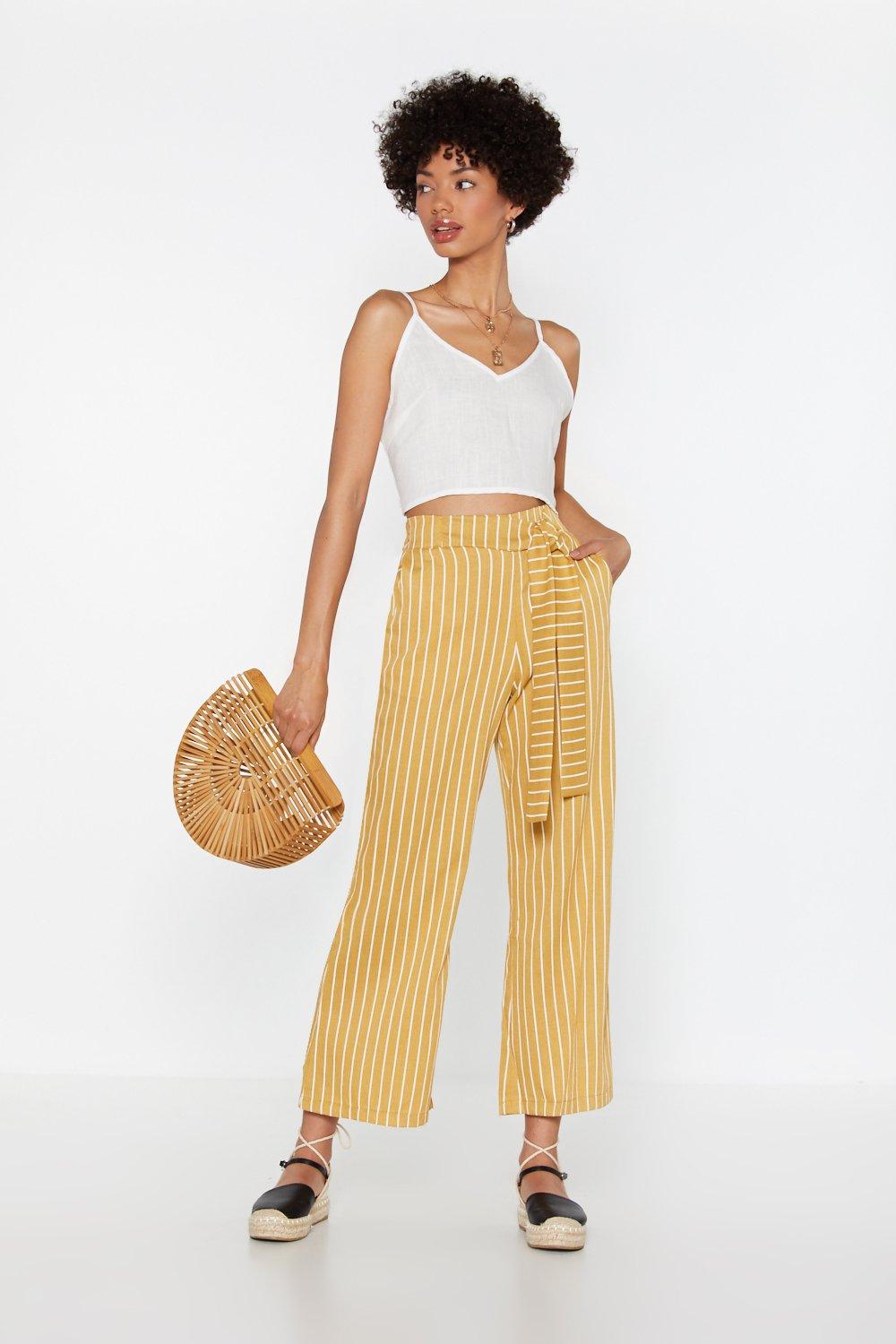 yellow cropped trousers