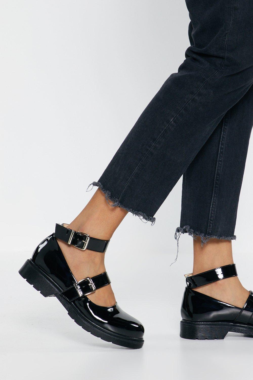 black patent flat shoes