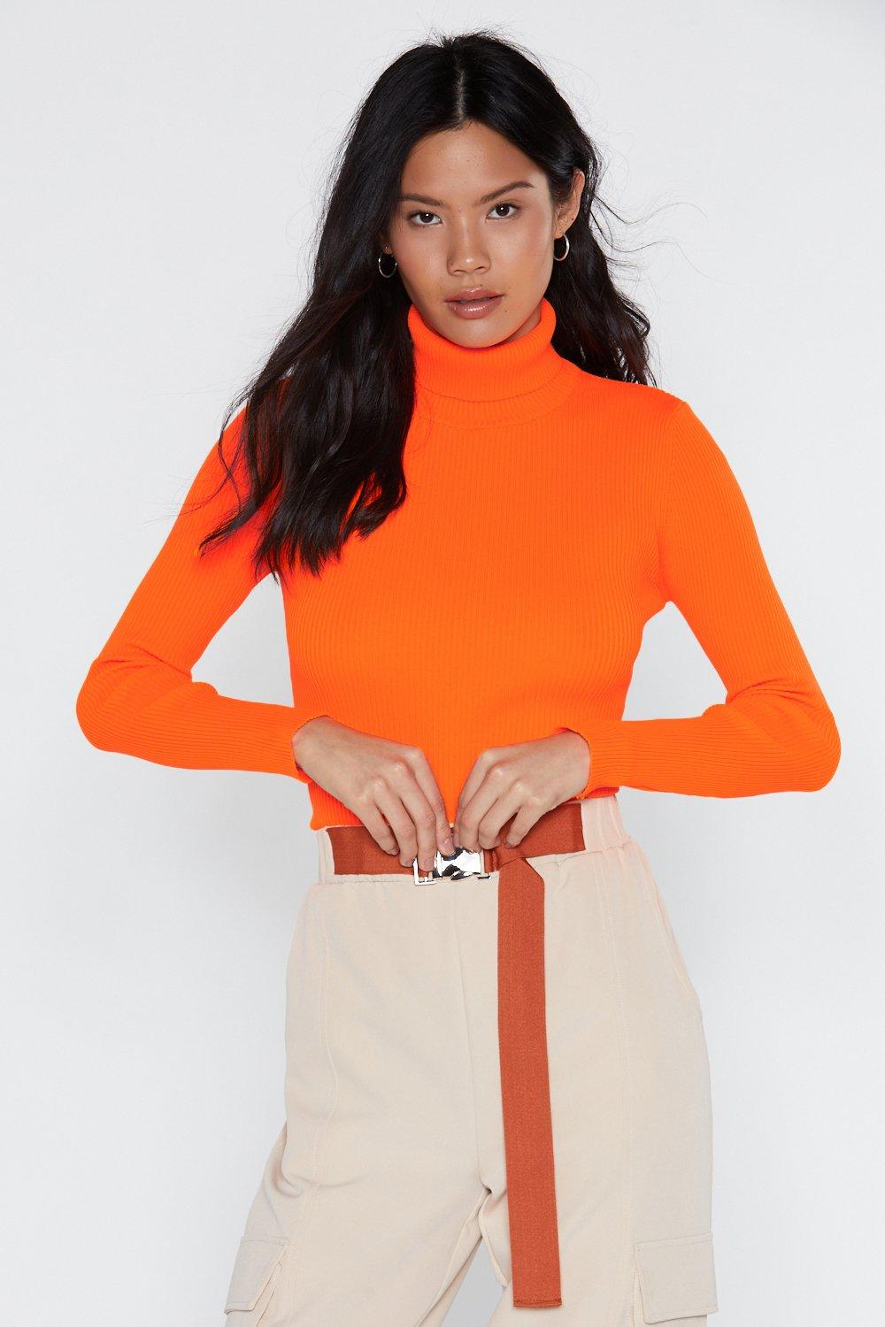 orange turtleneck sweater