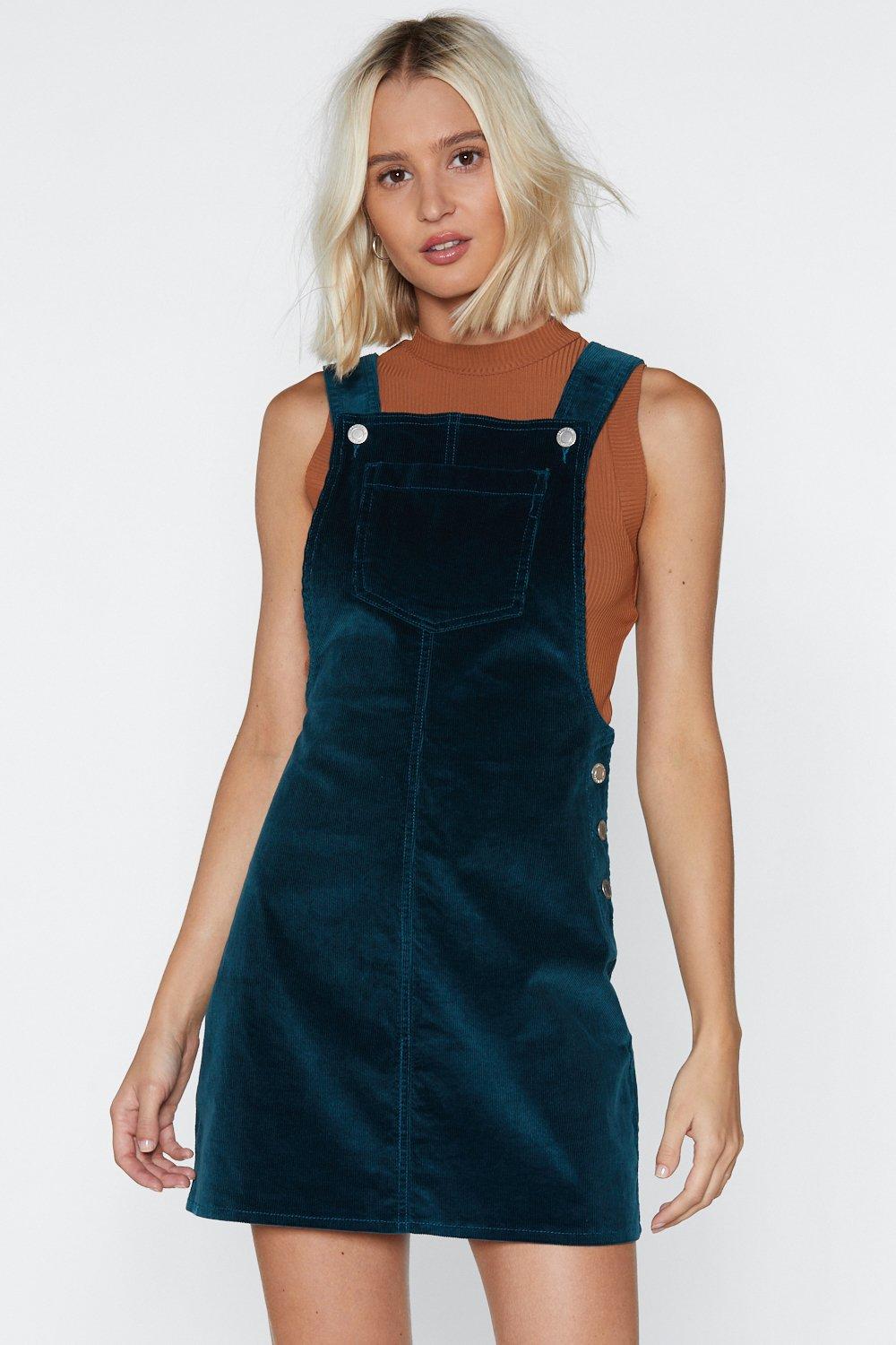 green cord pinafore dress