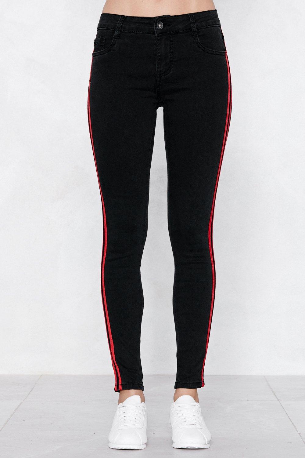 black skinny jeans with red stripe