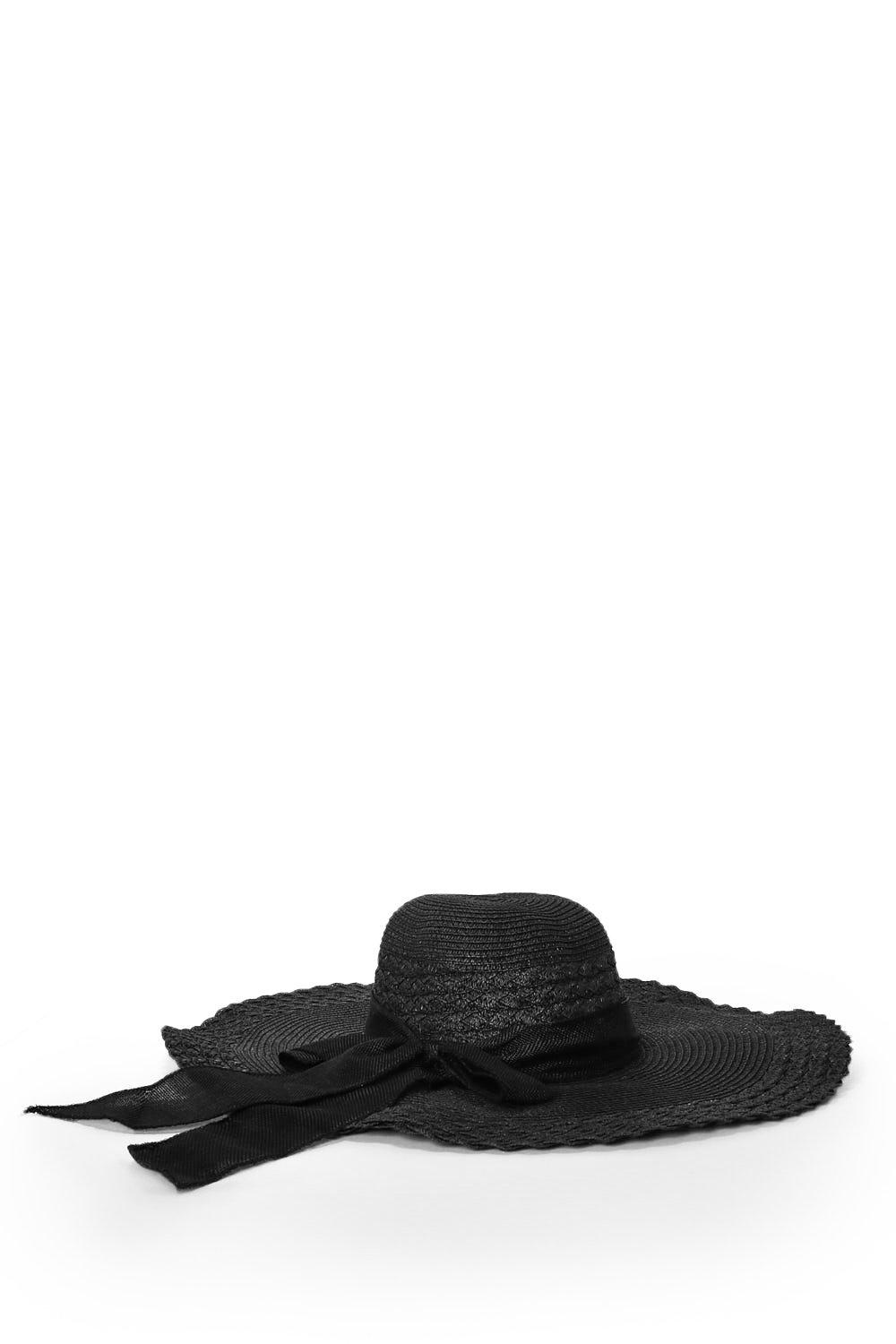 white floppy hat with black bow