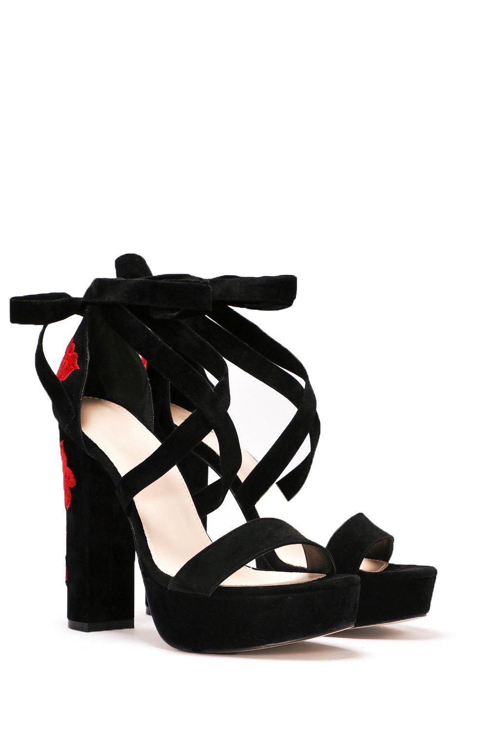 black heels with roses on them