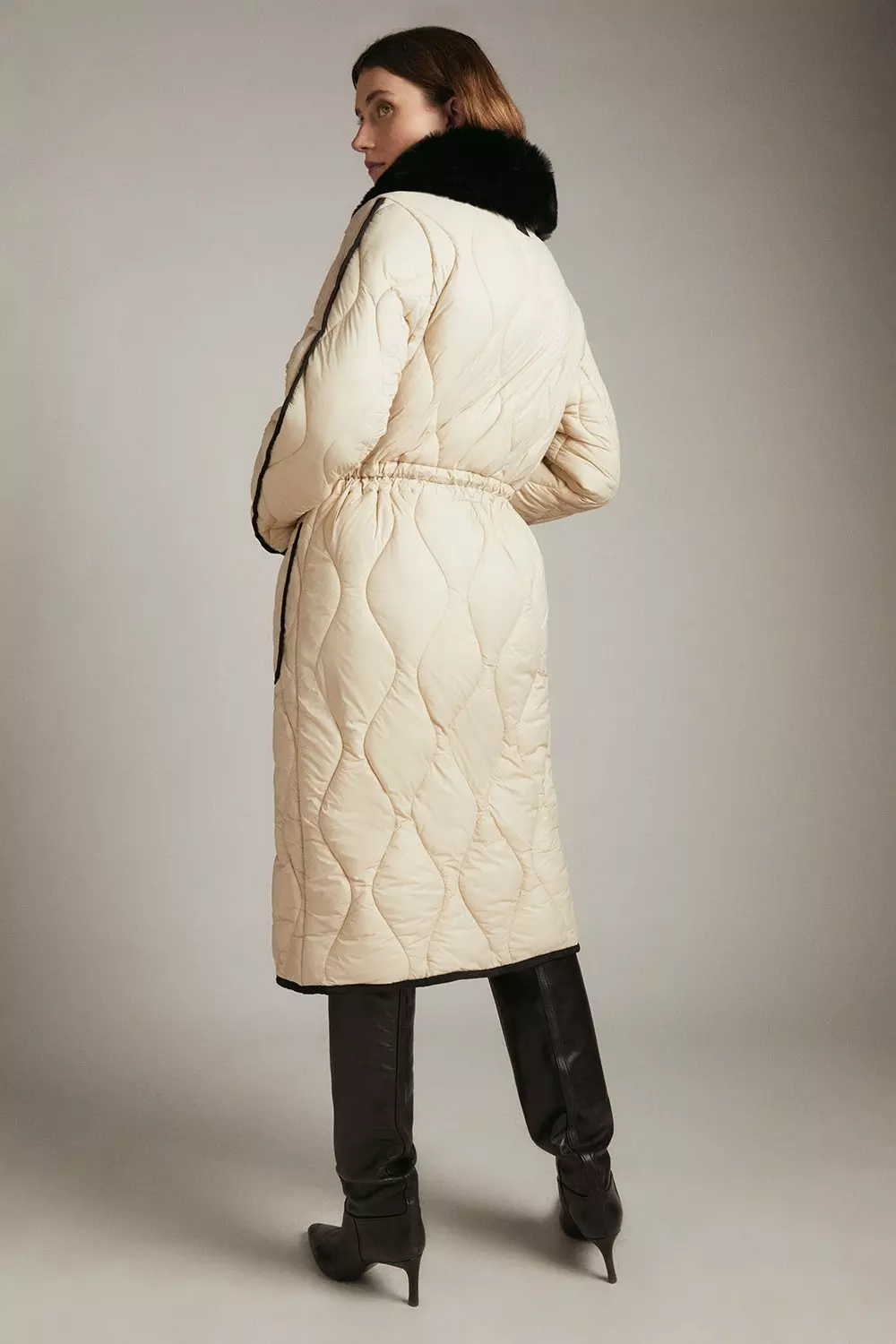 Long quilted coat sales with fur hood