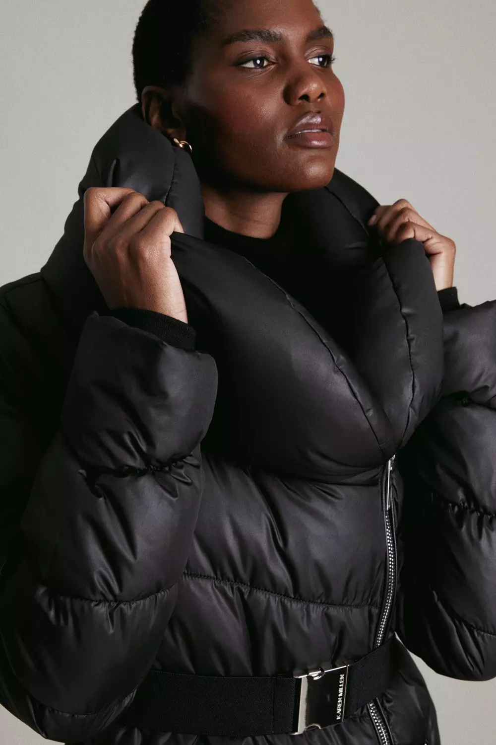 Long belted store puffer jacket