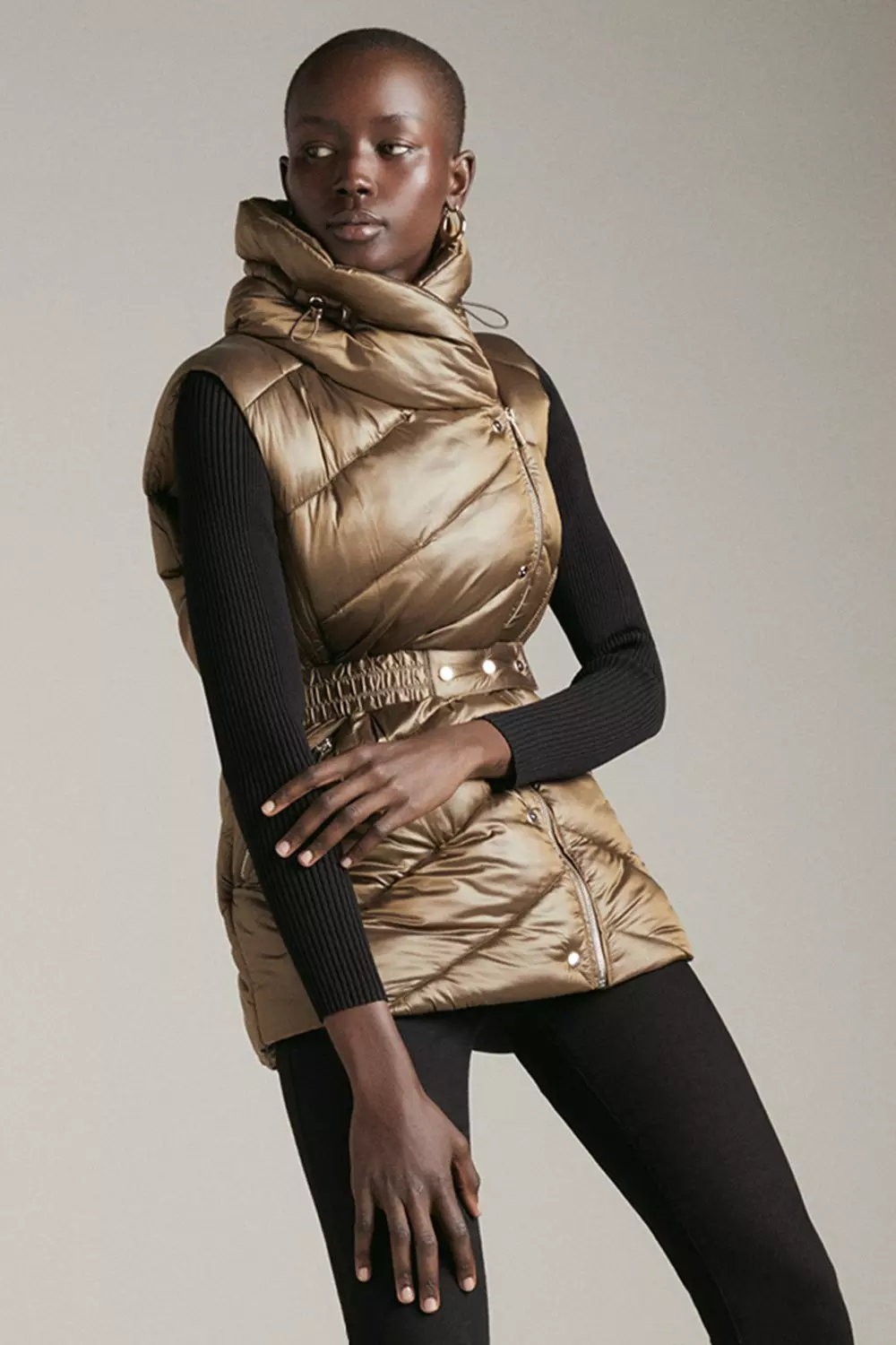 Metallic gold puffer sales vest