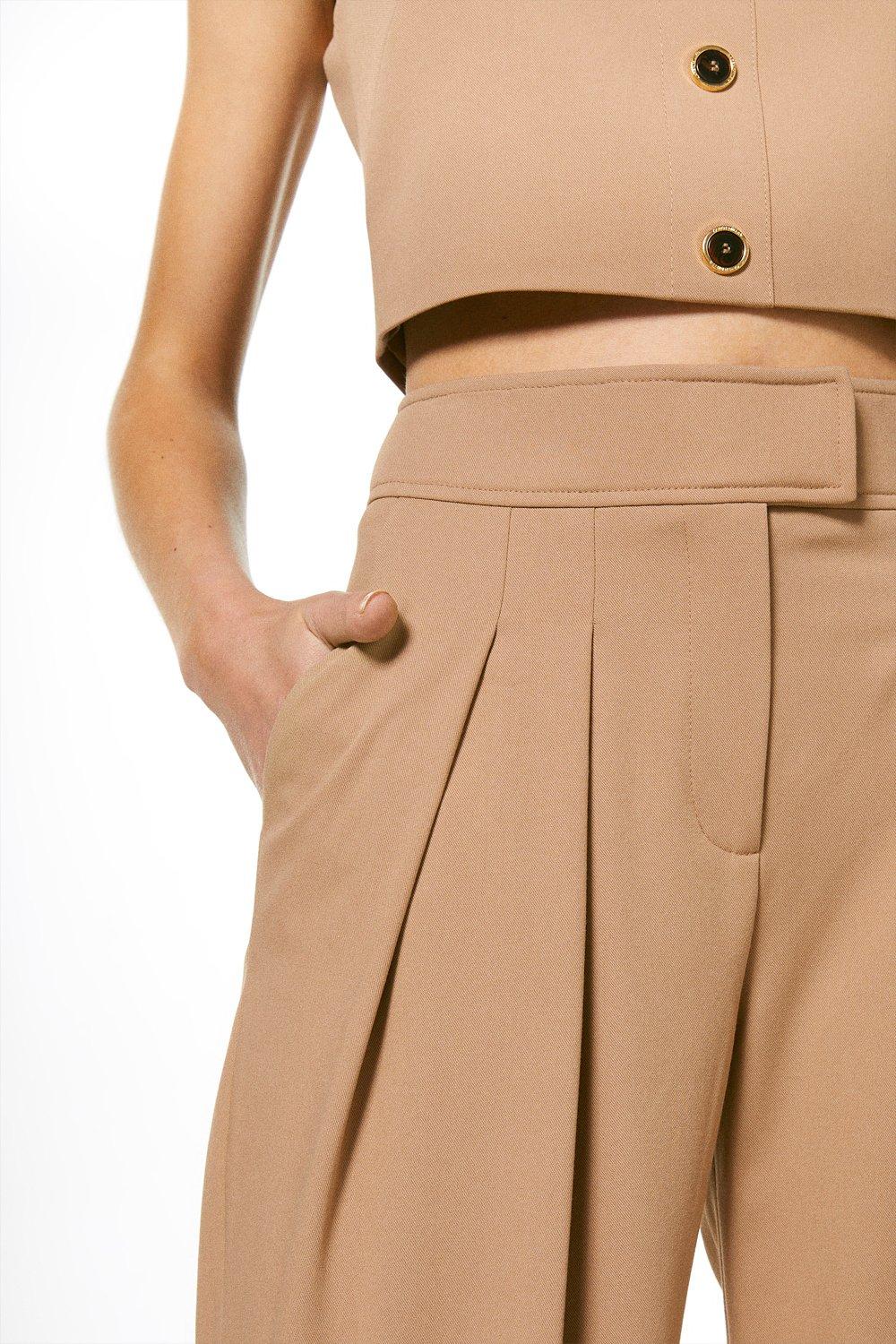 camel pleated trousers