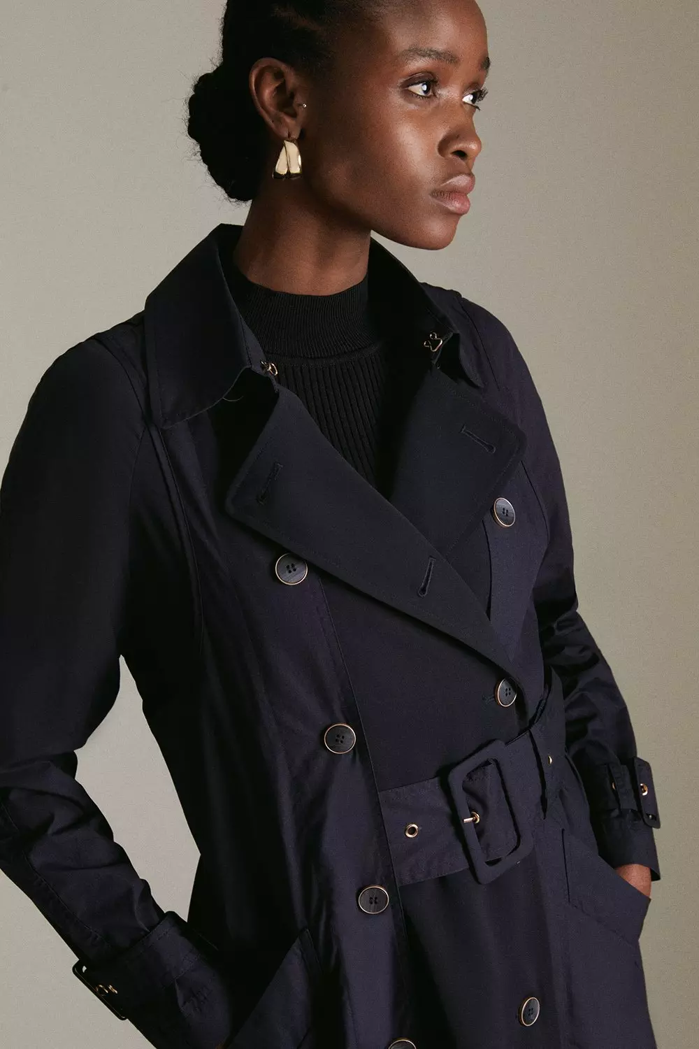 Trench coat with pleated on sale back