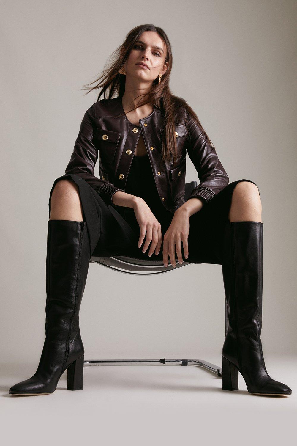 Sling leather knee-high boots