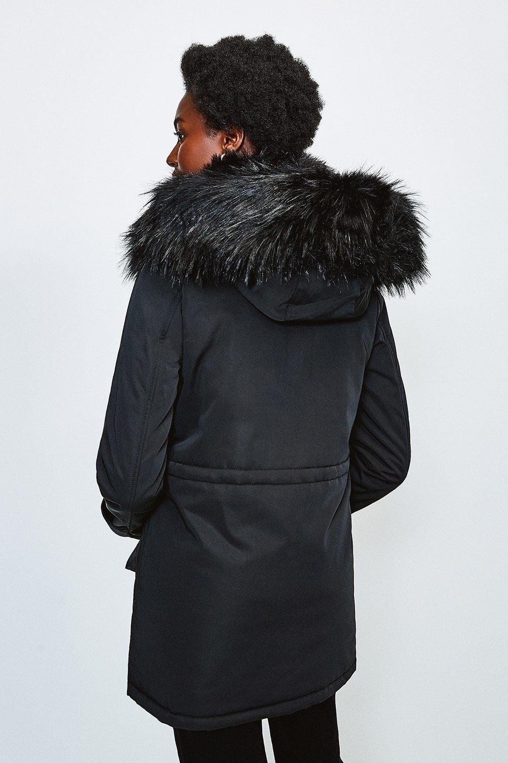 black parka with grey fur hood