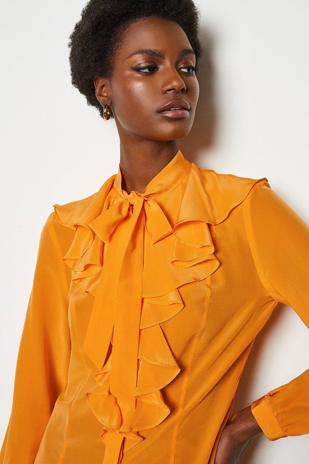 orange ruffle blouse