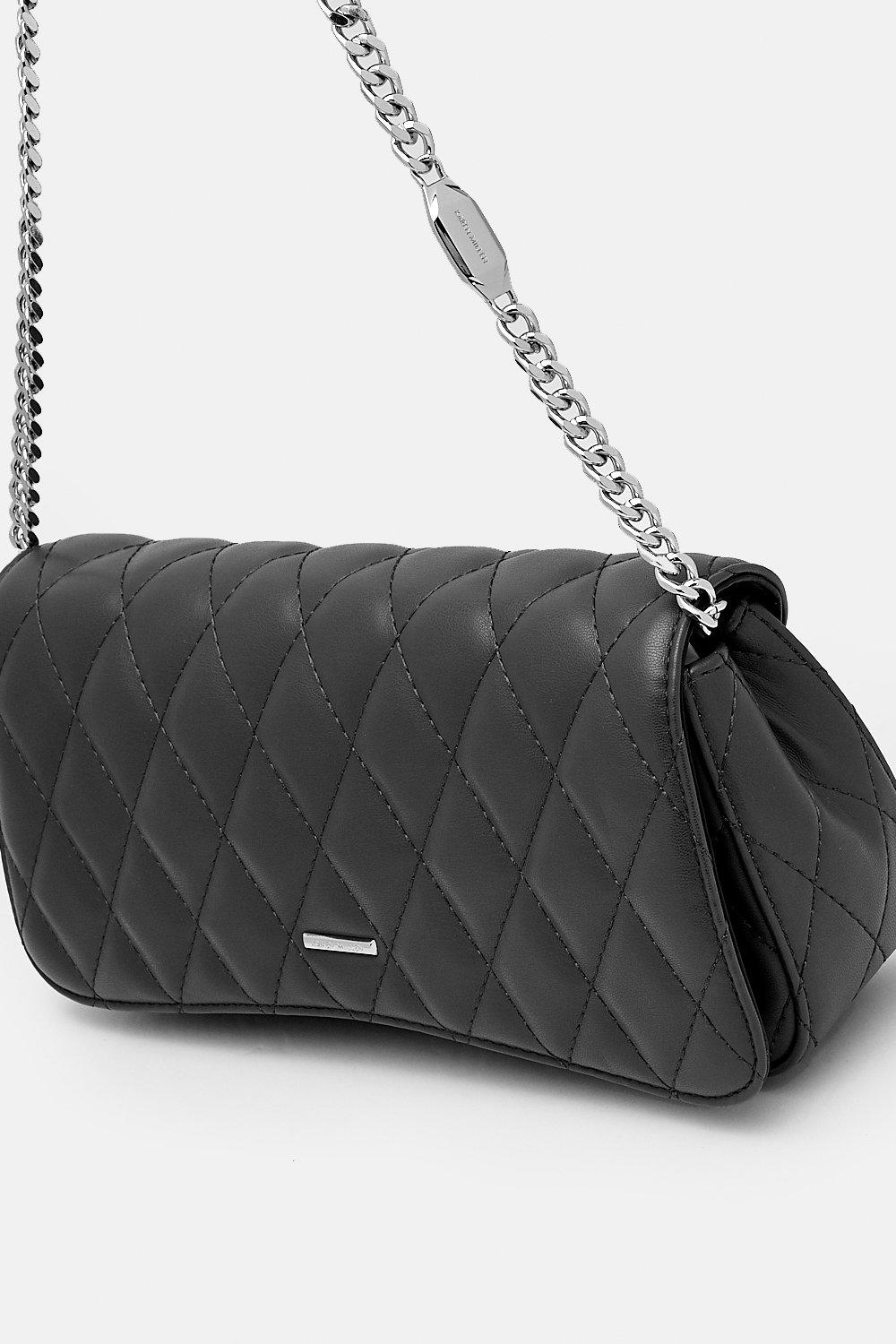 black quilted luggage