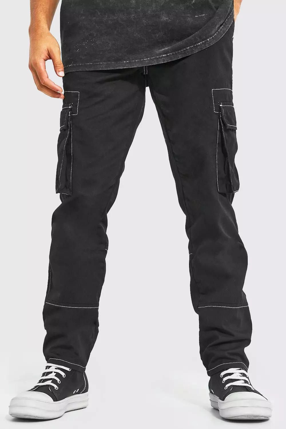 ASOS DESIGN seam detail cargo pants in black with contrast stitch