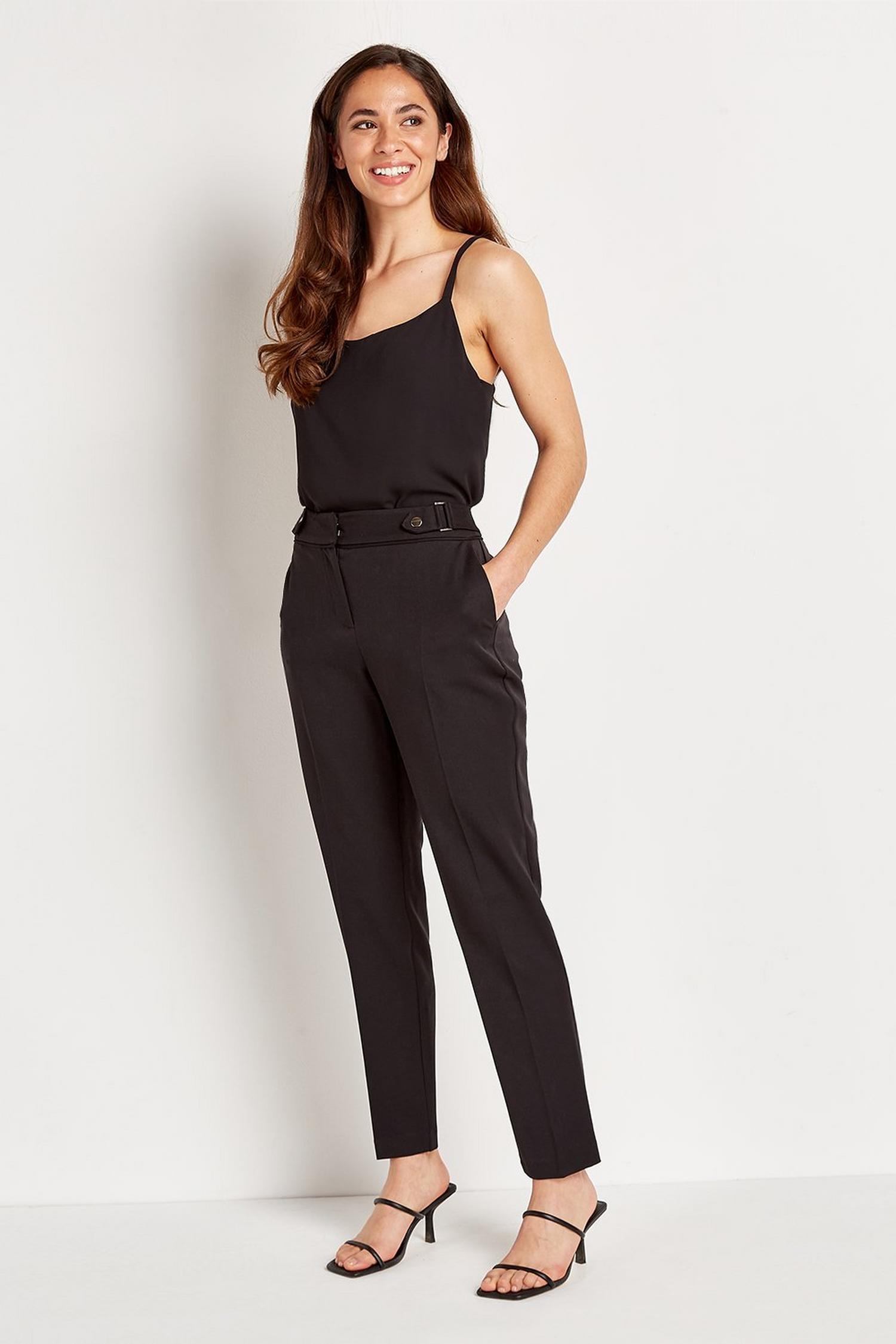 green tapered trousers