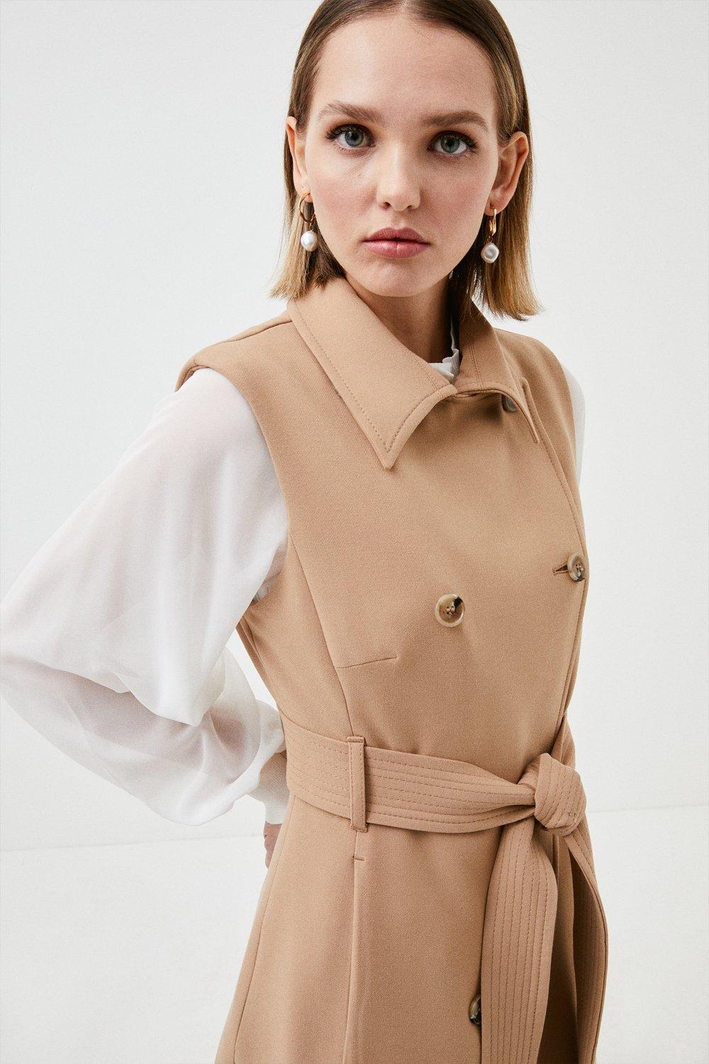 belted sleeveless coat